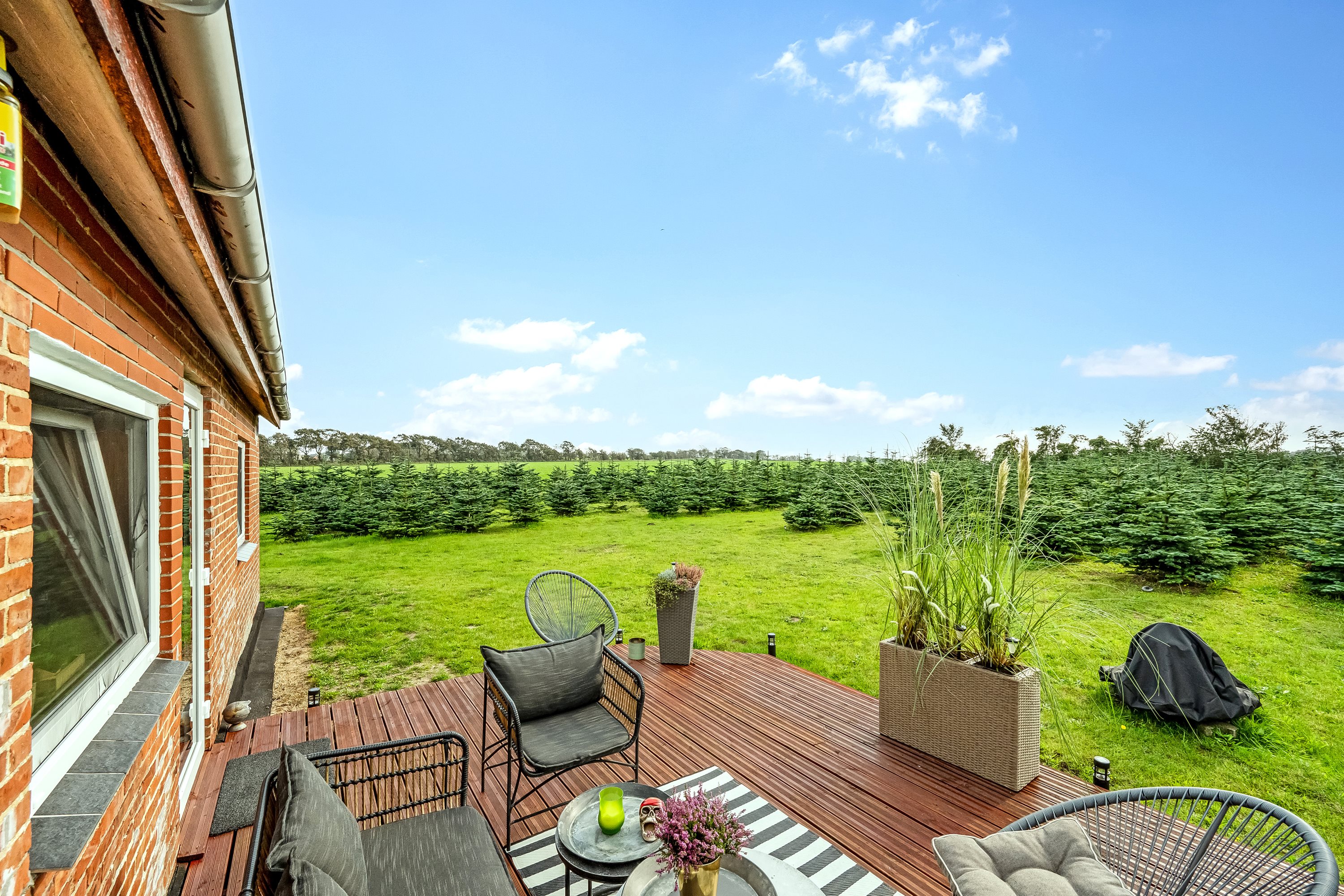 Fremhævet terrasse billede i fuldskærmstilstand. Billede af Birkelundvej 1, Vorgod Ø, 6920 Videbæk