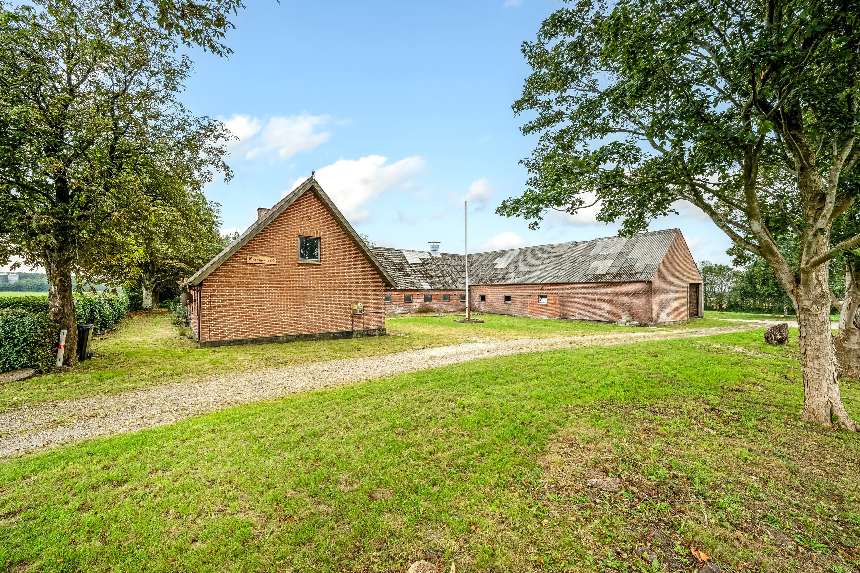 Fremhævet facade billede i fuldskærmstilstand. Billede af Birkelundvej 2, Vorgod Ø, 6920 Videbæk