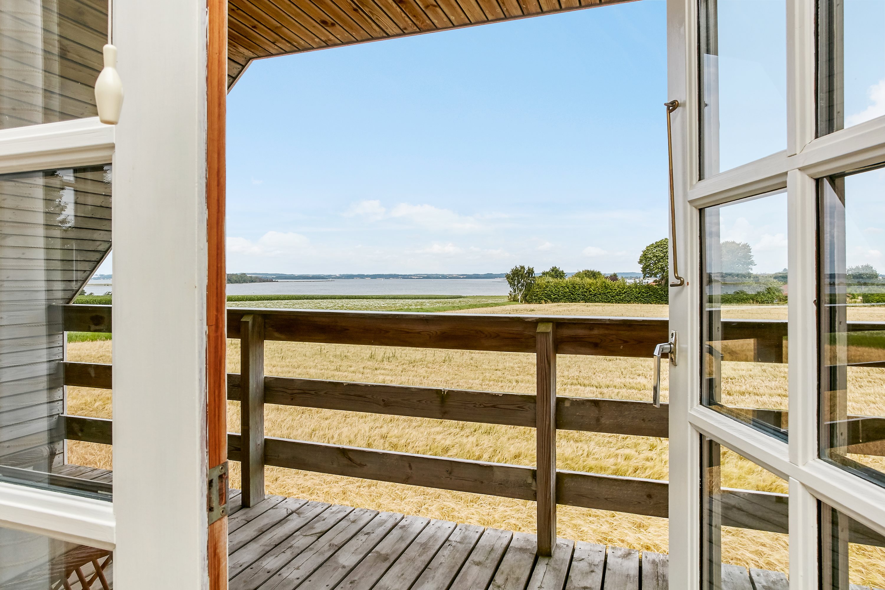 Fremhævet altan billede i fuldskærmstilstand. Billede af Snaptunvej 33A, Snaptun, 7130 Juelsminde