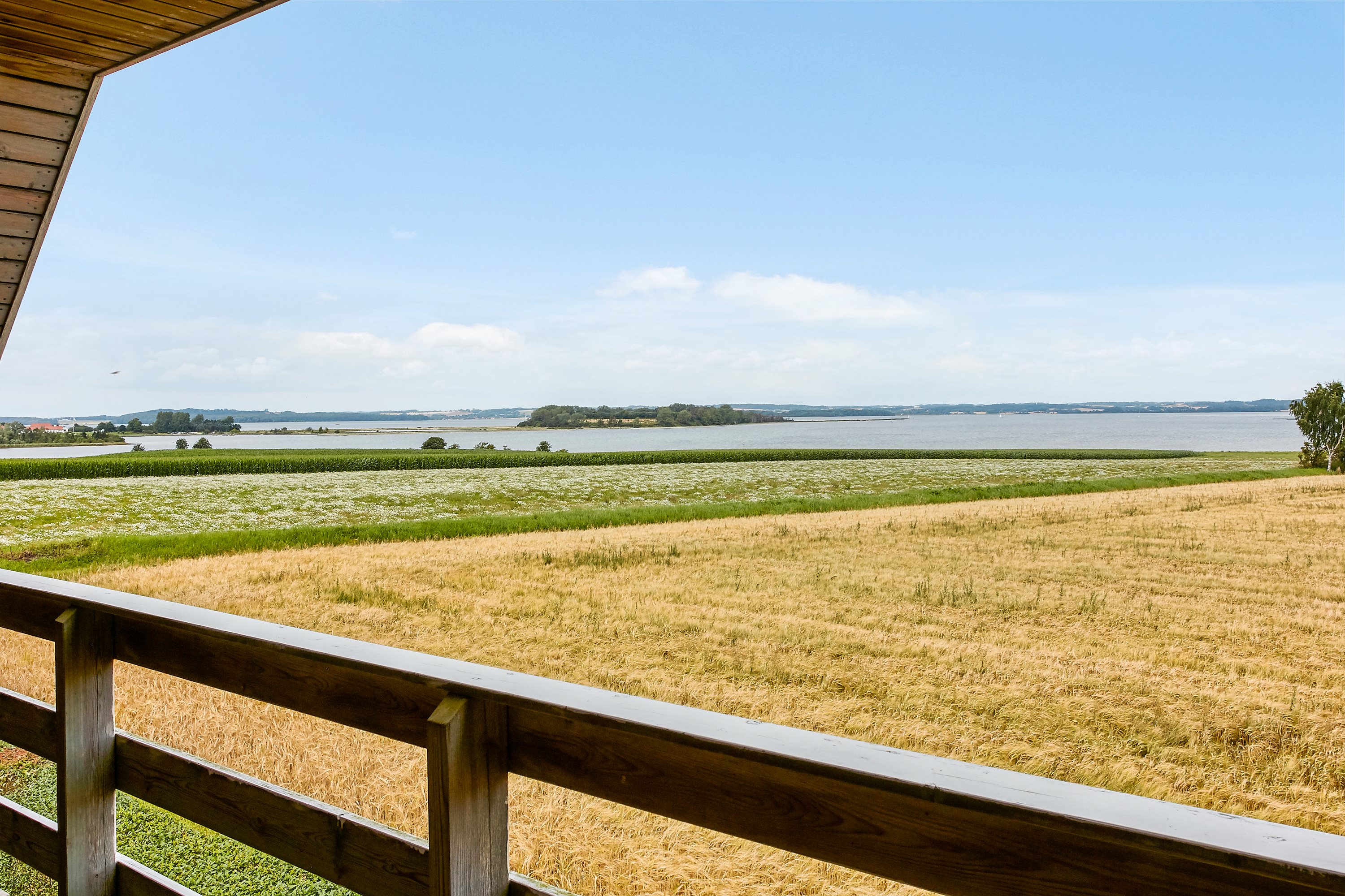 Fremhævet altan billede i fuldskærmstilstand. Billede af Snaptunvej 33A, Snaptun, 7130 Juelsminde