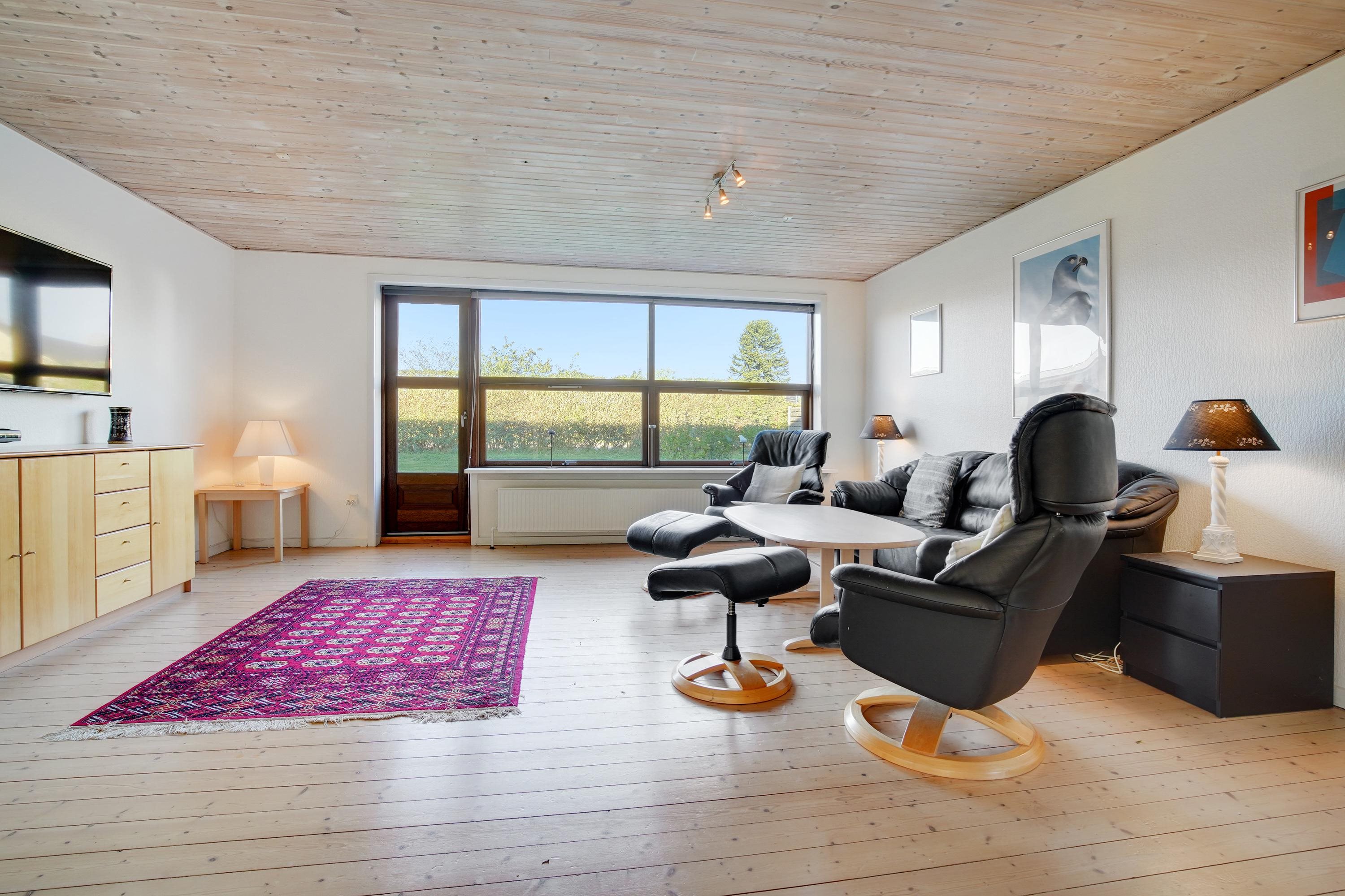 Fremhævet stue billede i fuldskærmstilstand. Billede af Tørholmsvej 114, 9800 Hjørring