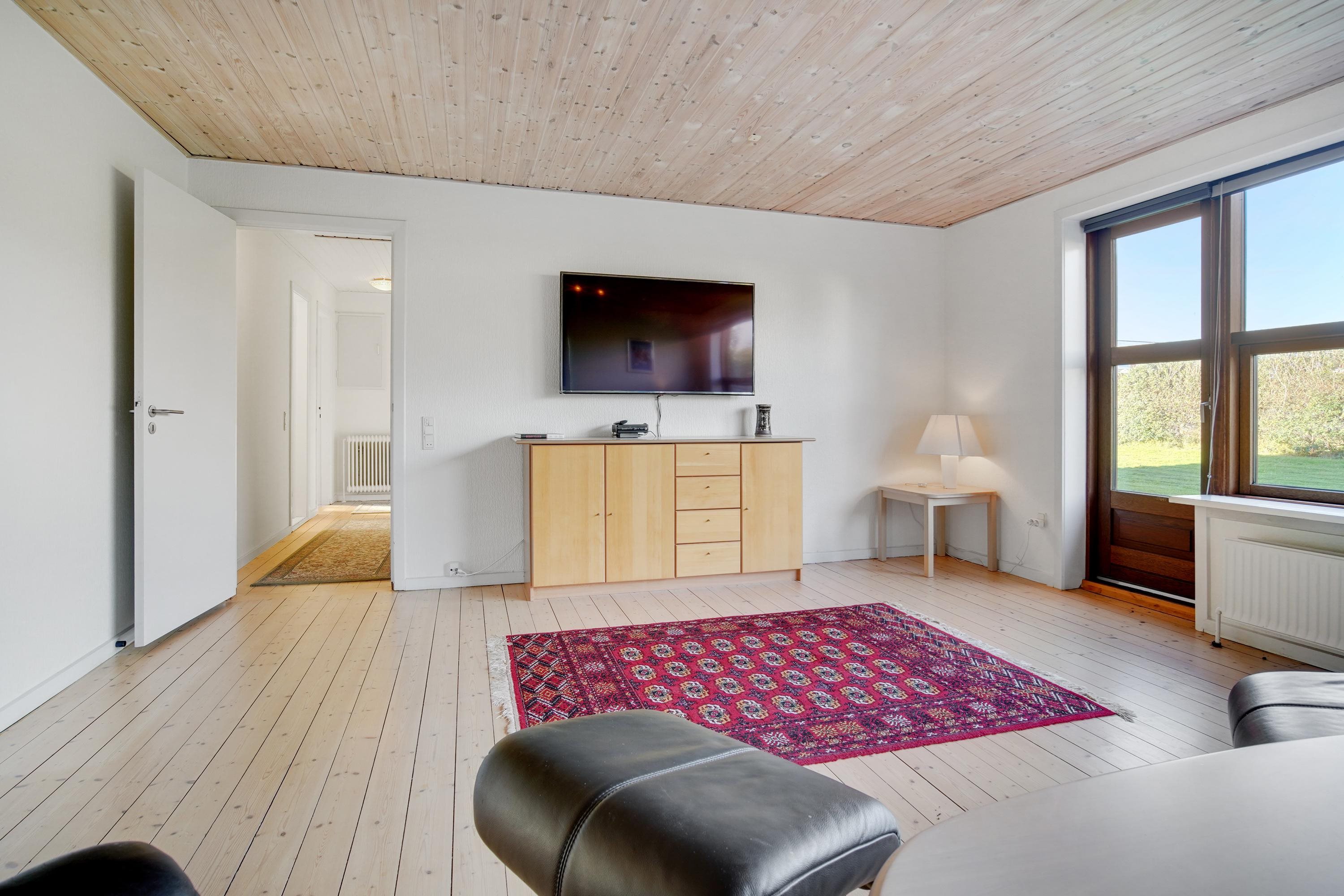 Fremhævet stue billede i fuldskærmstilstand. Billede af Tørholmsvej 114, 9800 Hjørring