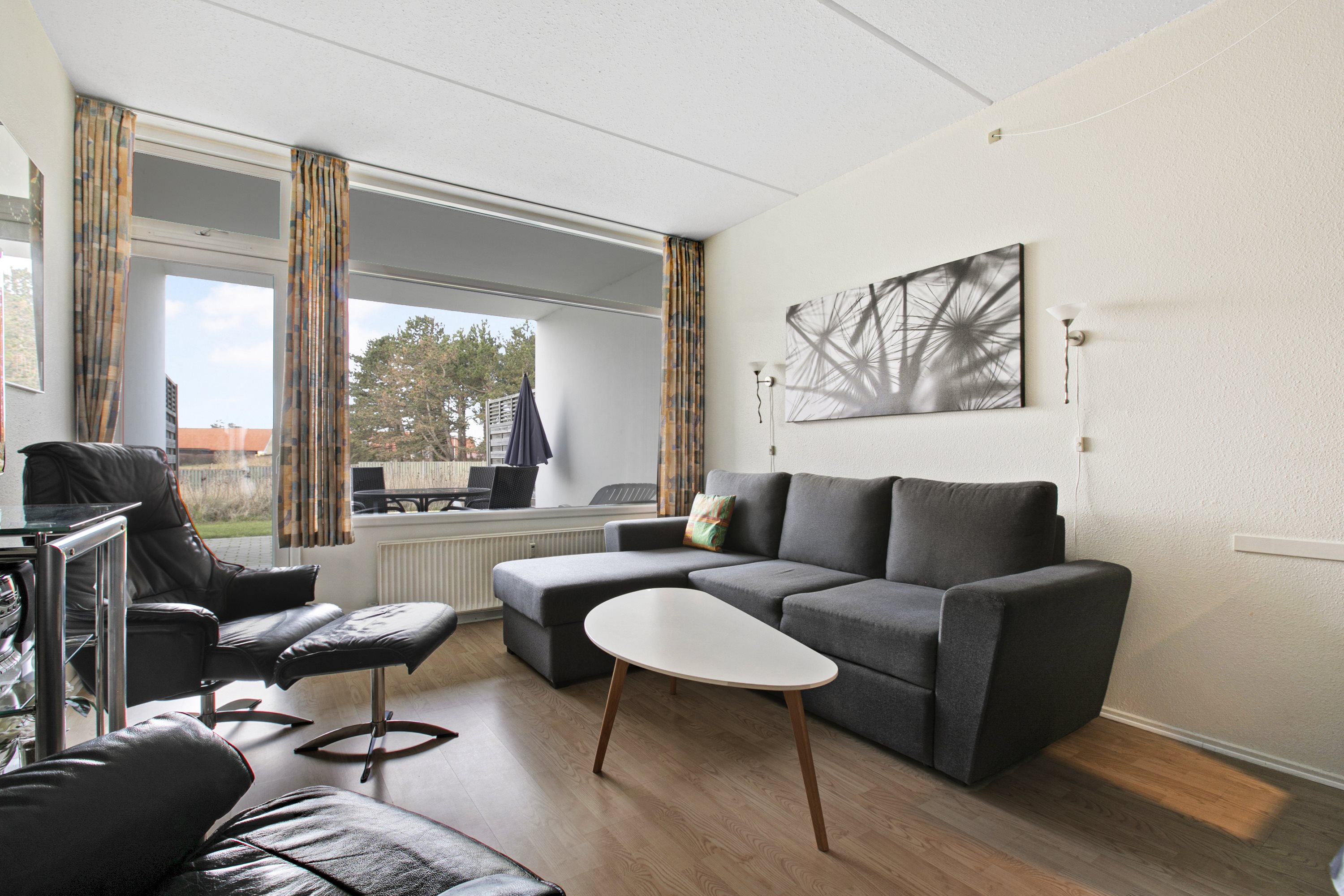 Fremhævet stue billede i fuldskærmstilstand. Billede af Fægangsvej 11D, st.. 110., Bønnerup Strand, 8585 Glesborg