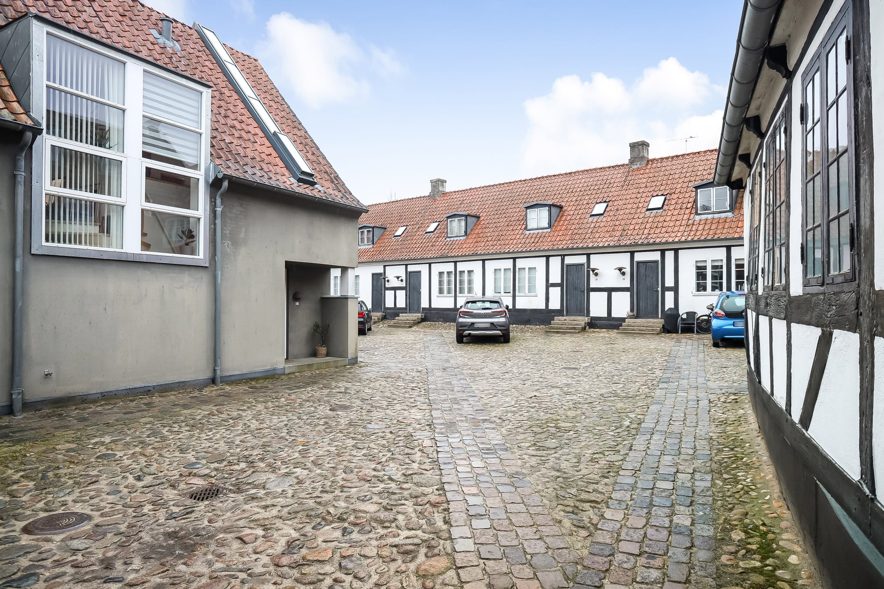 Fremhævet ejendommen billede i fuldskærmstilstand. Billede af Nytorv 3H, 8800 Viborg