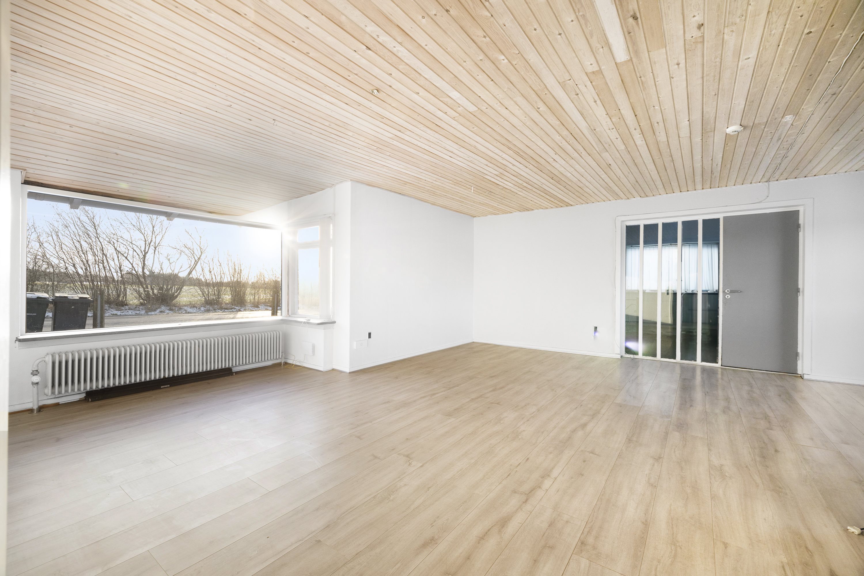 Fremhævet stue billede i fuldskærmstilstand. Billede af Bogensevej 54, Bukkerup, 5620 Glamsbjerg