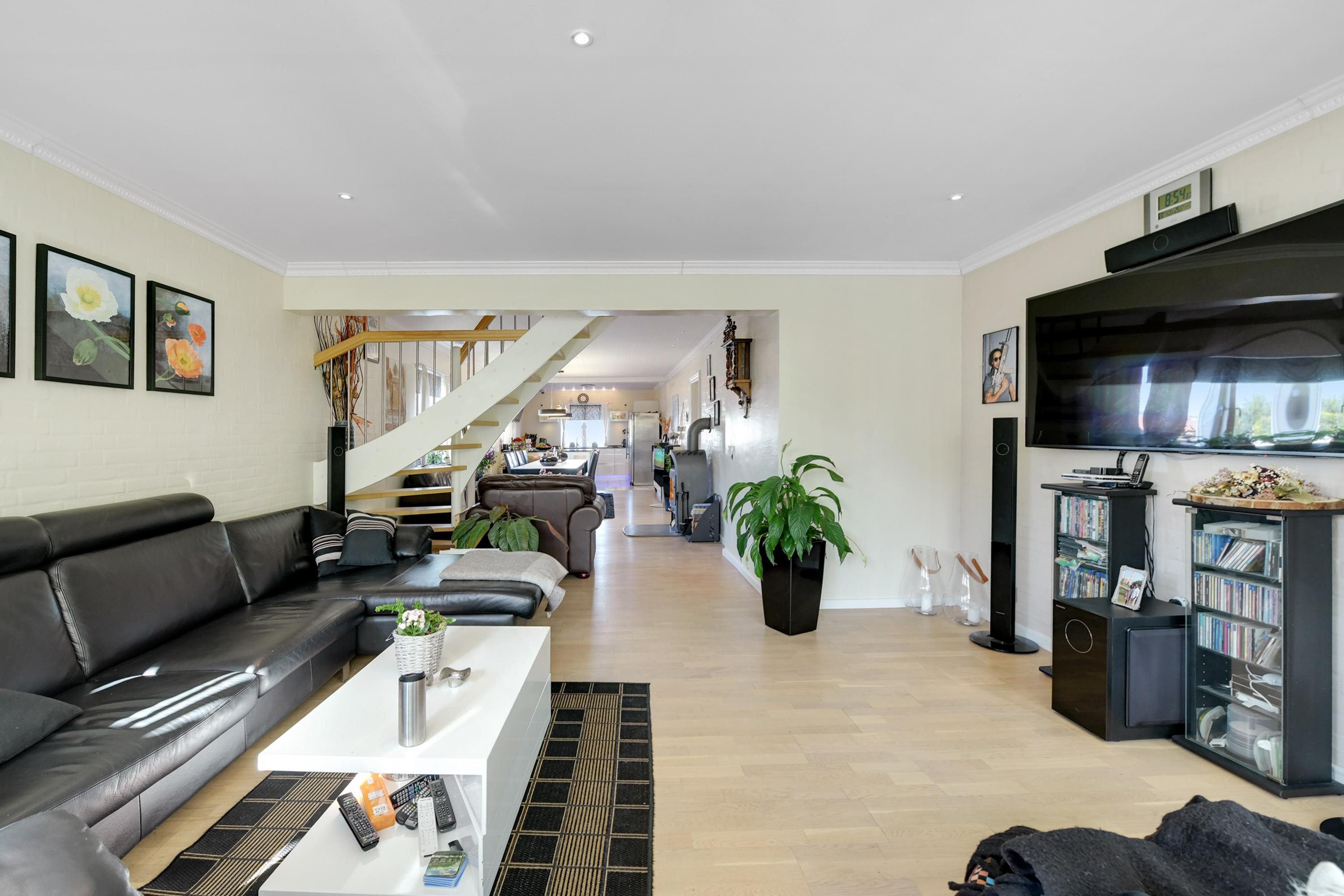 Fremhævet stue billede i fuldskærmstilstand. Billede af P.A. Madvigs Vej 28, 6100 Haderslev