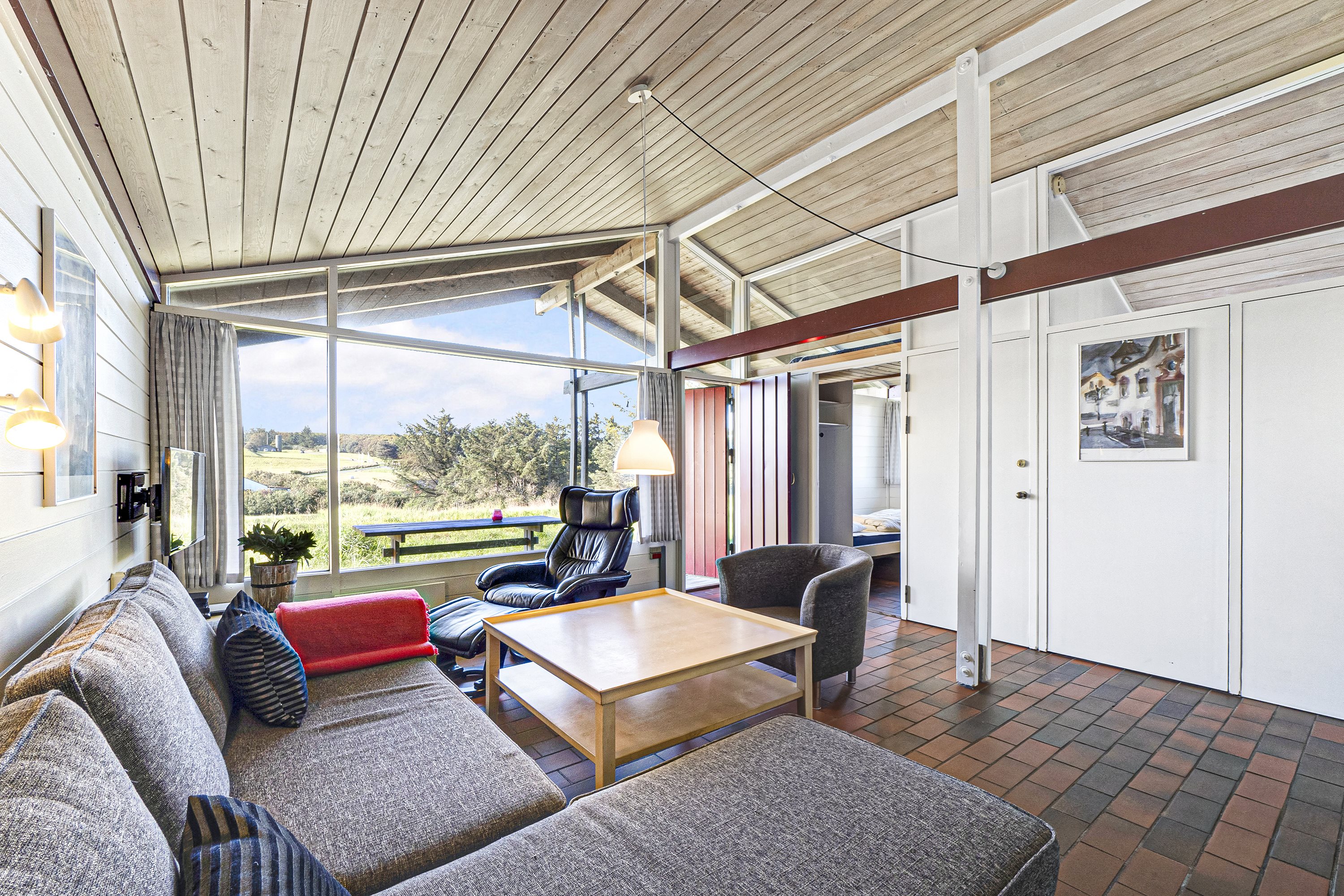 Fremhævet stue billede i fuldskærmstilstand. Billede af Solskinsvej 25, Vigsø, 7730 Hanstholm