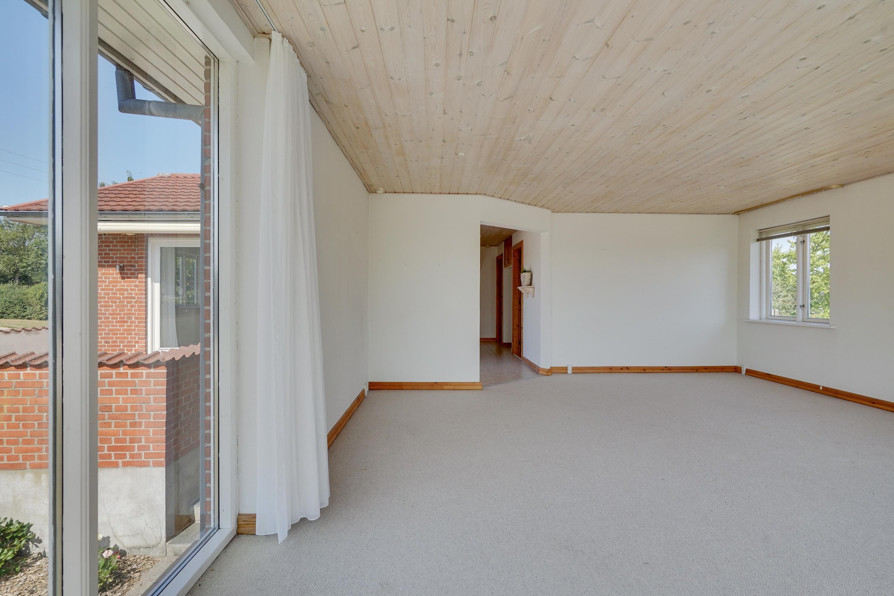 Fremhævet stue billede i fuldskærmstilstand. Billede af Tørholmsvej 102, 9800 Hjørring