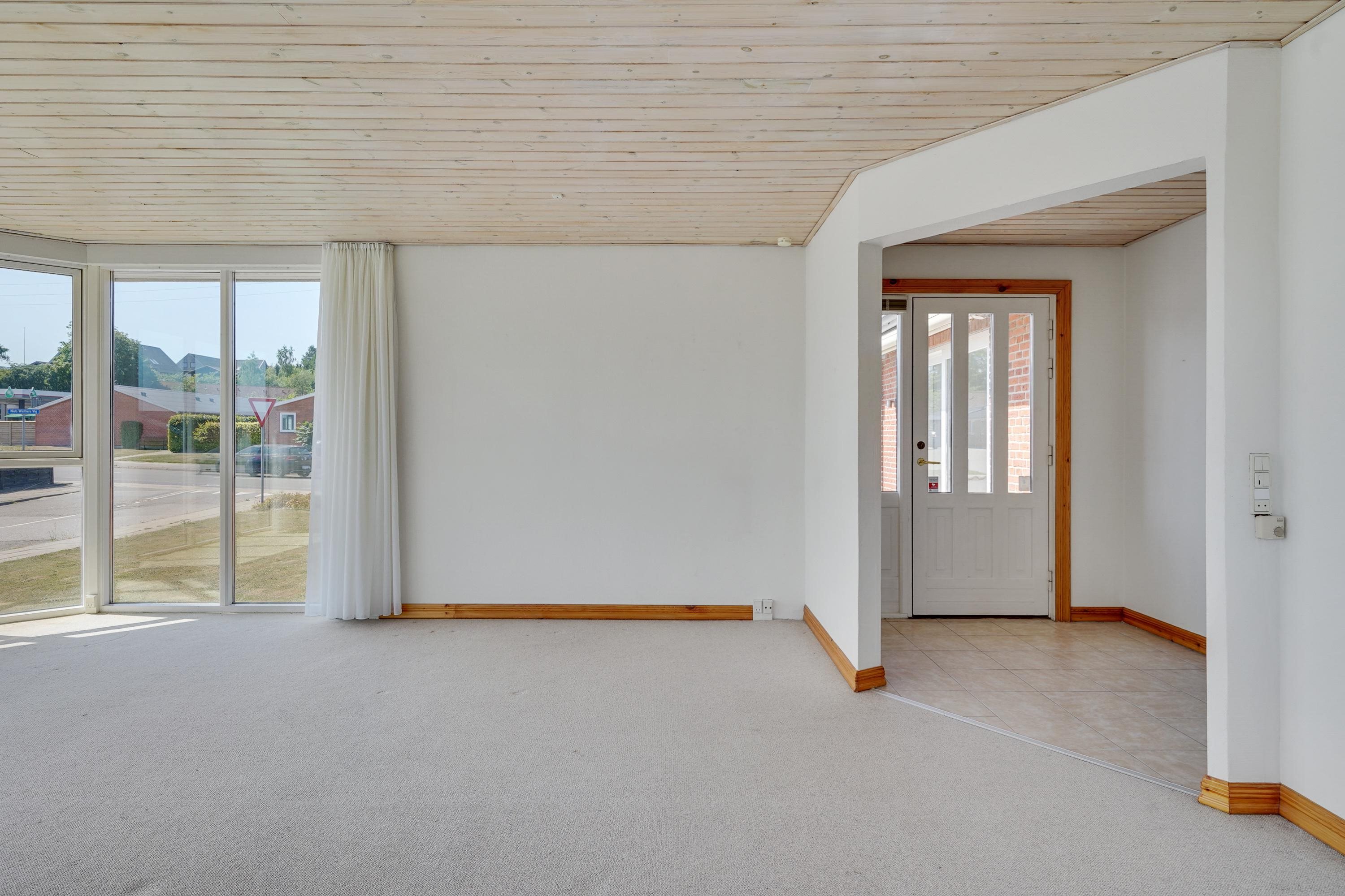 Fremhævet stue billede i fuldskærmstilstand. Billede af Tørholmsvej 102, 9800 Hjørring