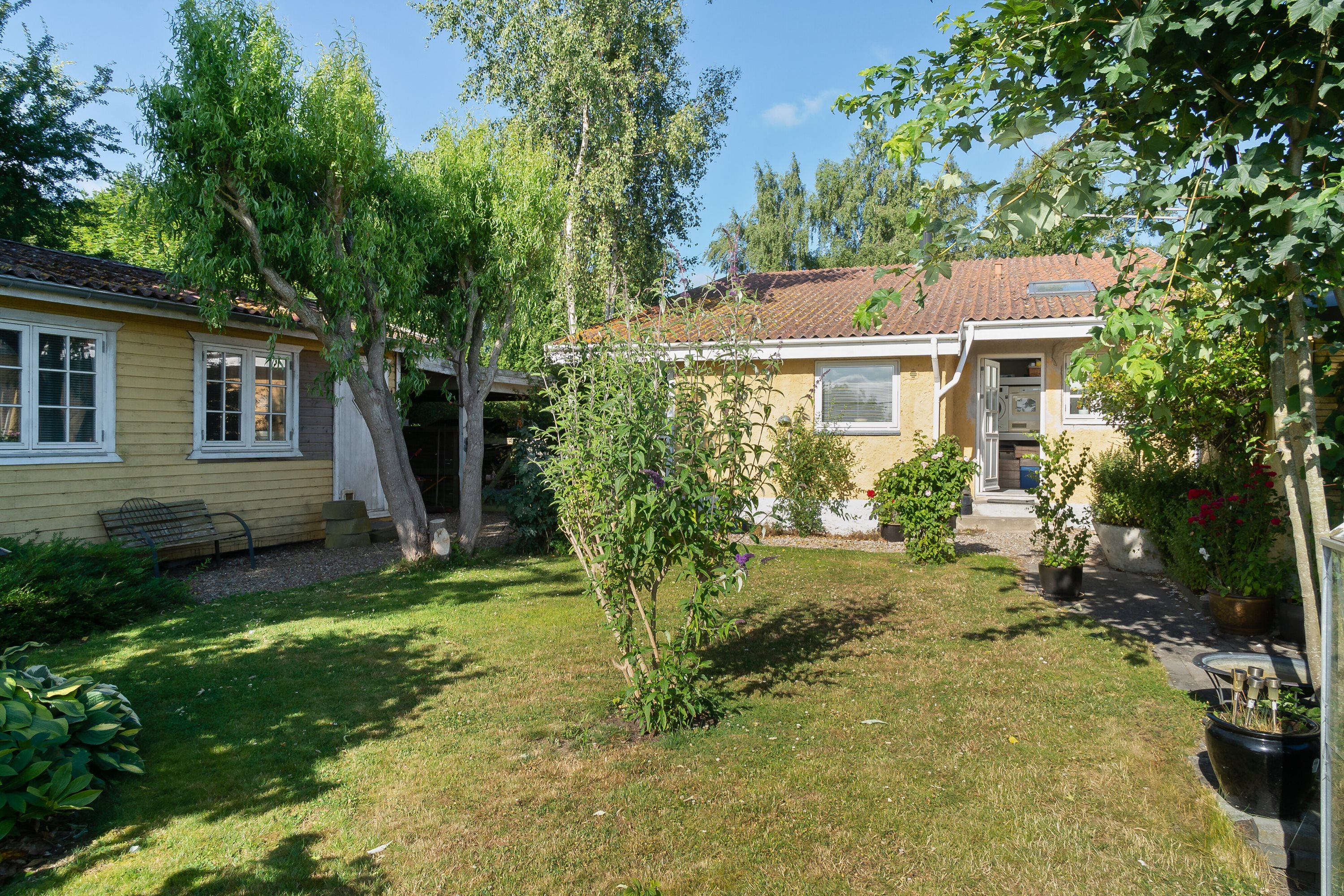 Fremhævet set fra haven billede i fuldskærmstilstand. Billede af Tømmerupvej 31, 4400 Kalundborg