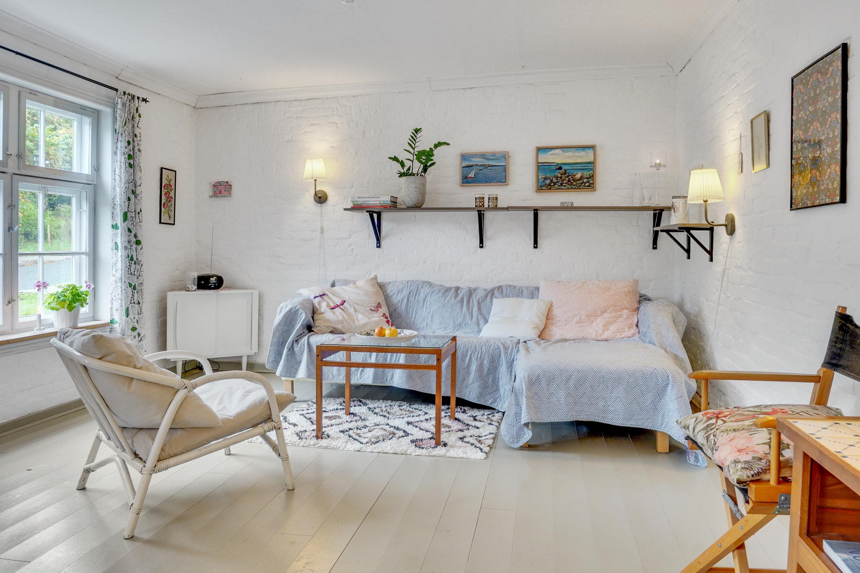 Fremhævet stue billede i fuldskærmstilstand. Billede af Kirkevej 265, Tolne, 9870 Sindal