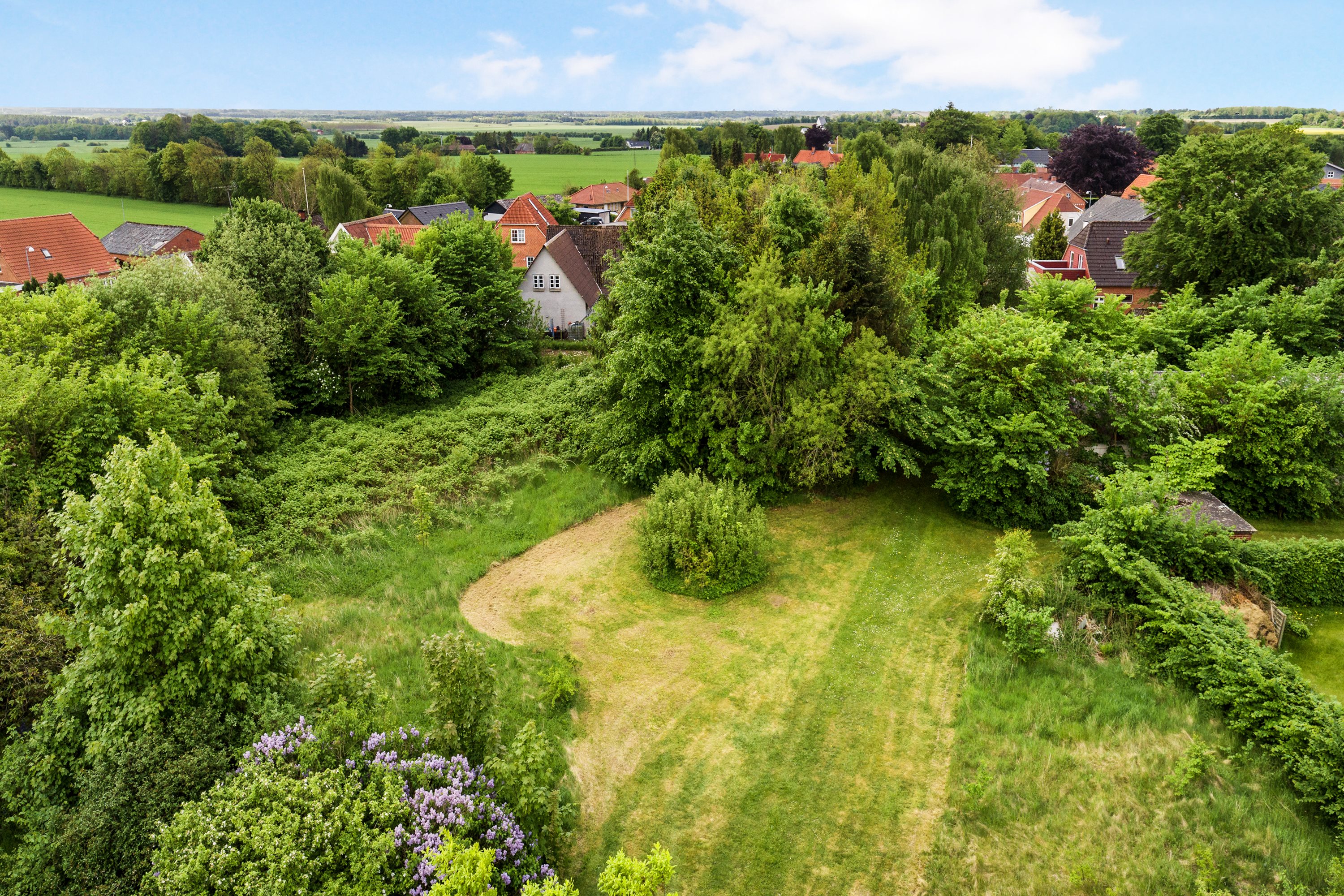 Fremhævet luftfoto billede i fuldskærmstilstand. Billede af Sportsvej 5, Jernvedlund, 6771 Gredstedbro
