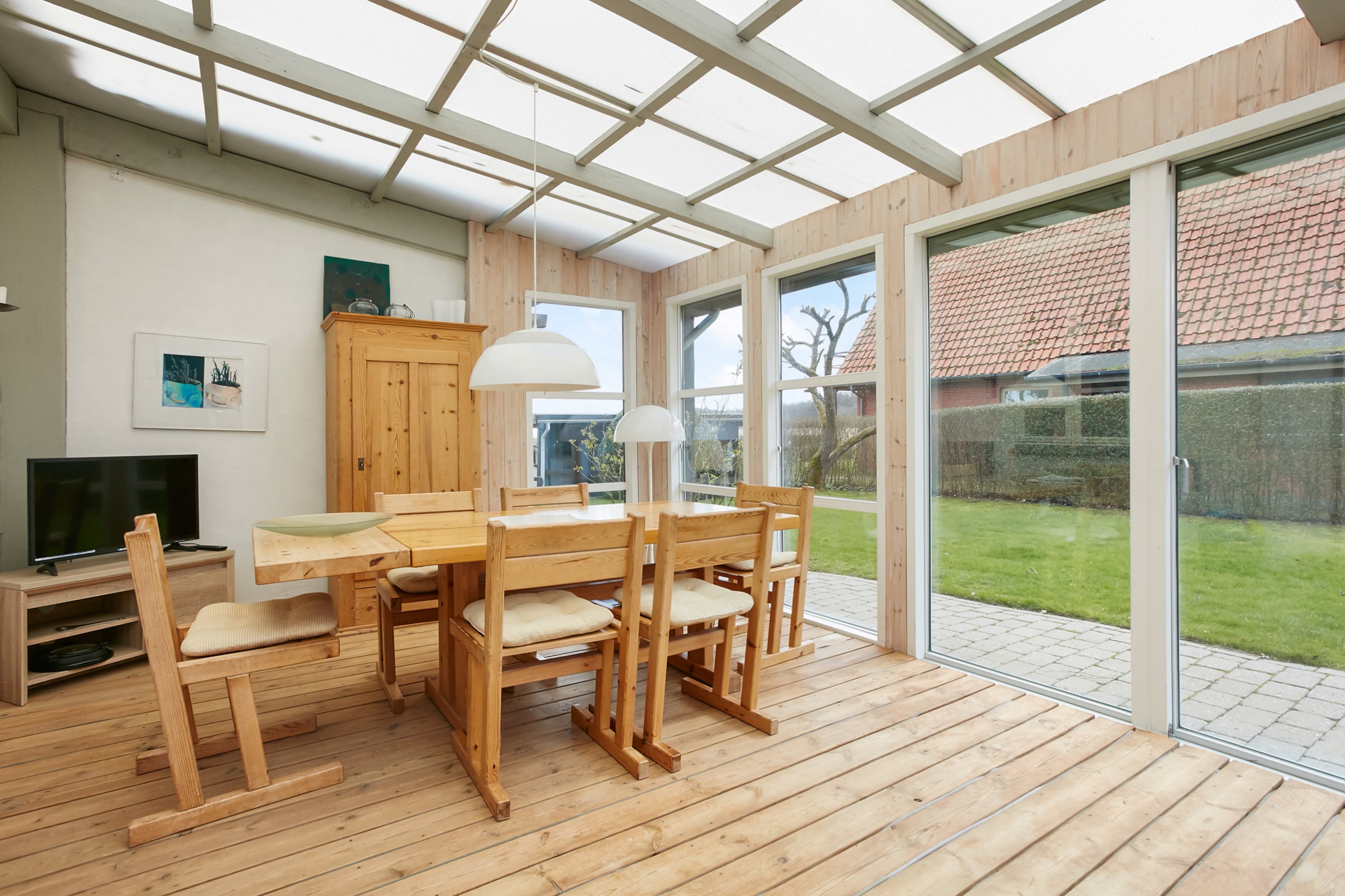 Fremhævet udestue billede i fuldskærmstilstand. Billede af Snaptun Strandvej 4, Snaptun, 7130 Juelsminde