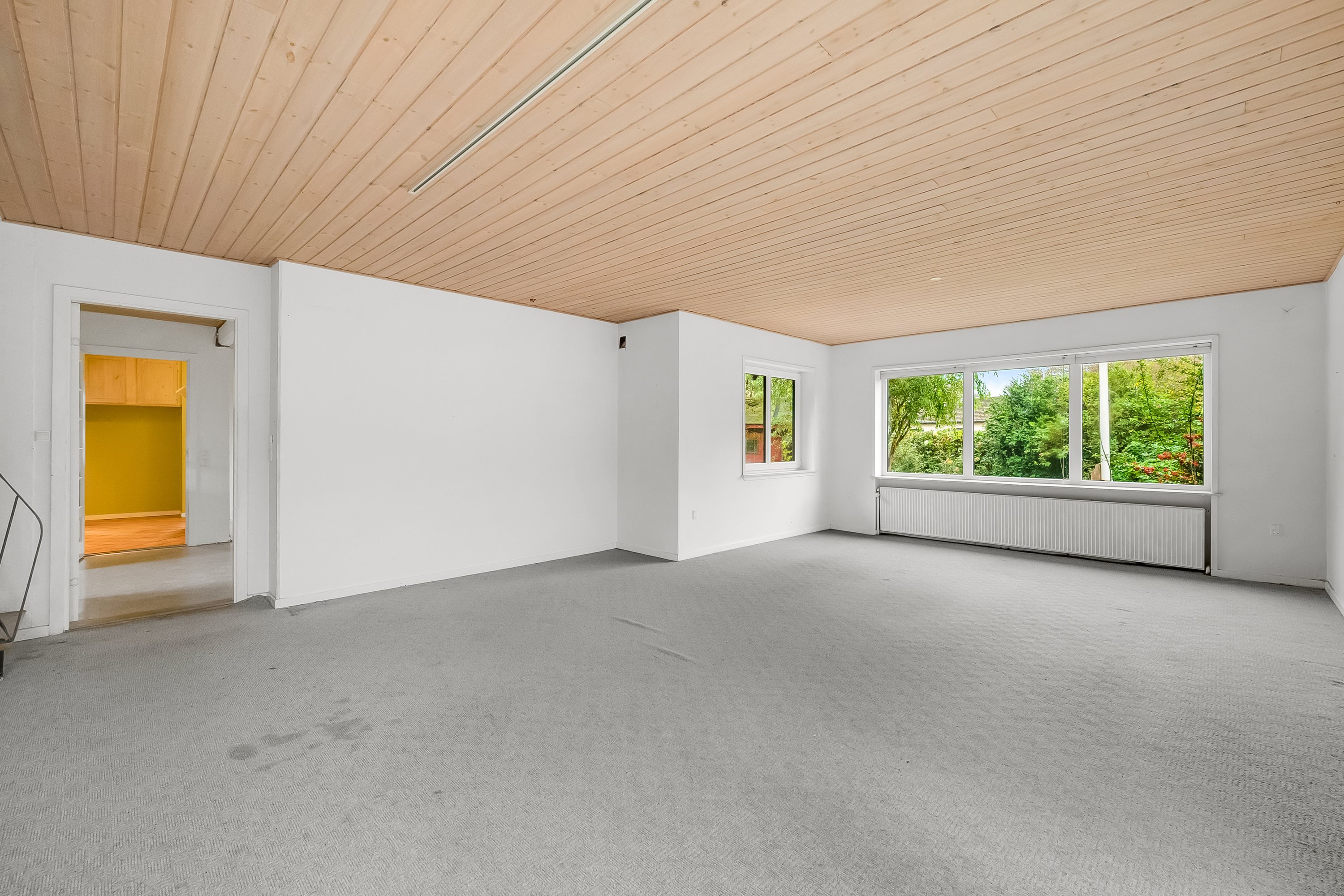 Fremhævet stue billede i fuldskærmstilstand. Billede af Toftevej 1, Bølling, 6900 Skjern