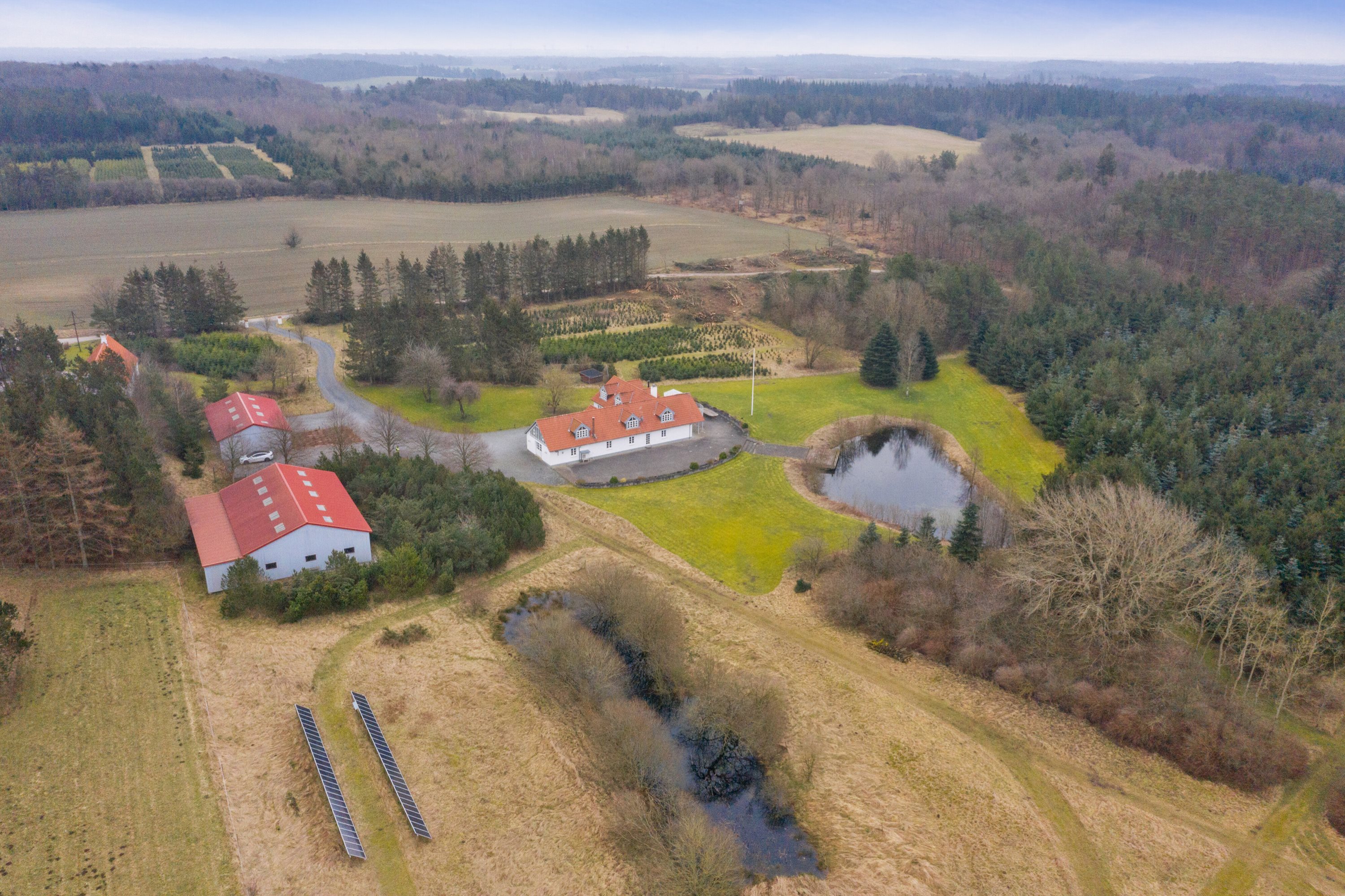 Fremhævet luftfoto billede i fuldskærmstilstand. Billede af Skovhusevej 48, Bælum, 9574 Bælum