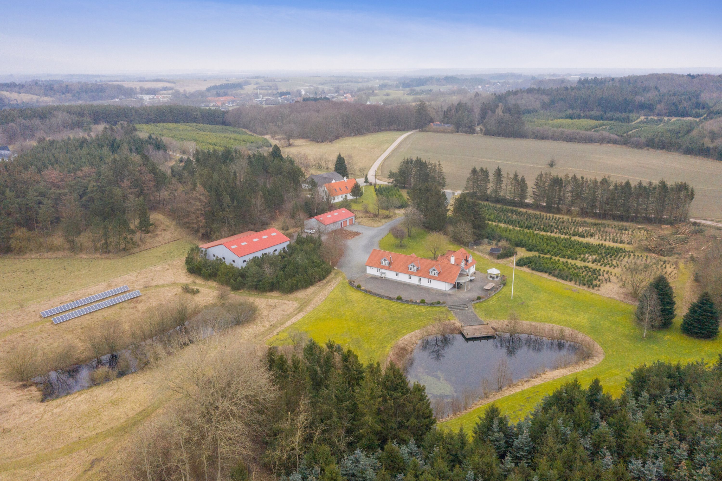 Fremhævet luftfoto billede i fuldskærmstilstand. Billede af Skovhusevej 48, Bælum, 9574 Bælum