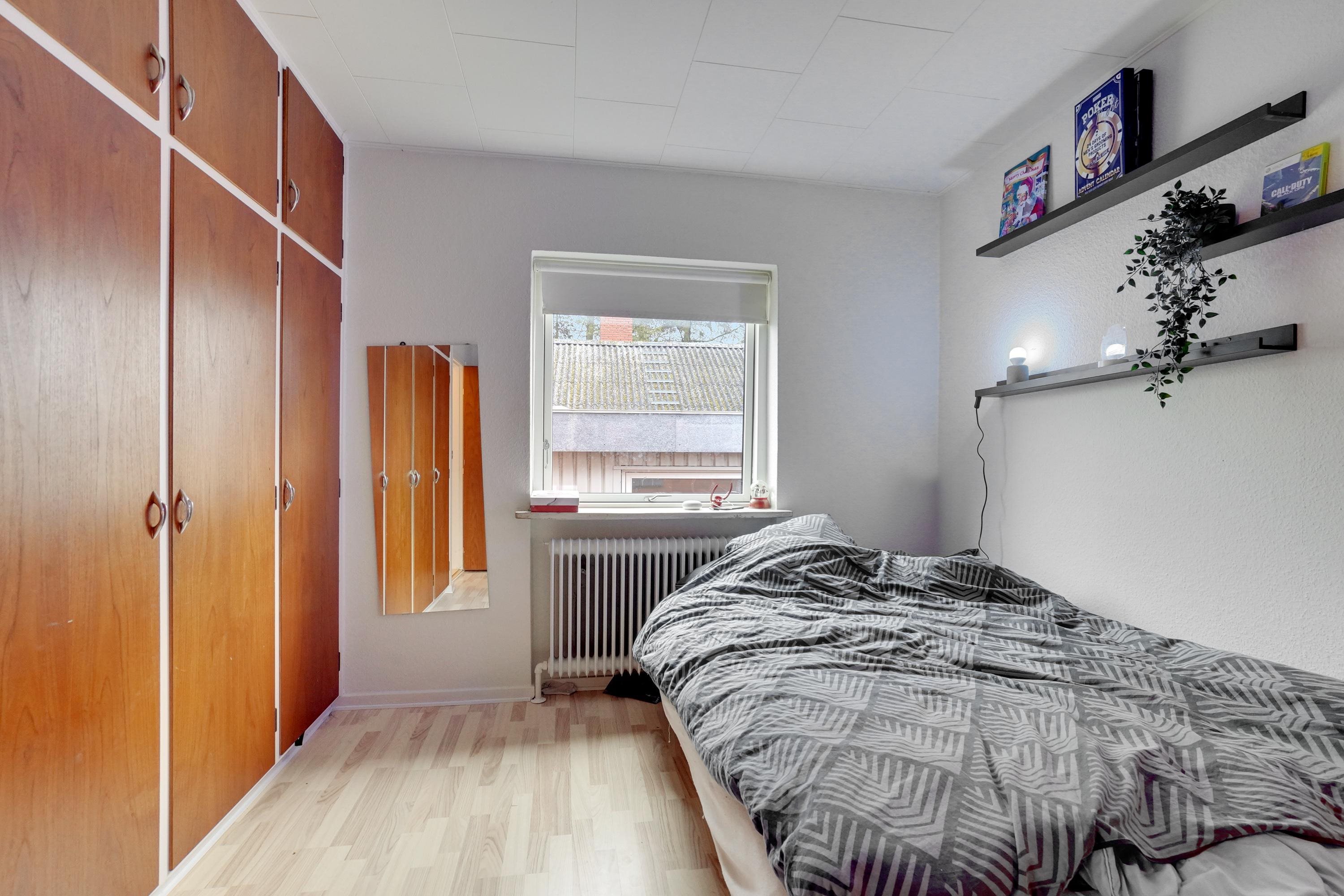 Fremhævet soveværelse billede i fuldskærmstilstand. Billede af Hollufgårdsvej 17, Højby, 5260 Odense S