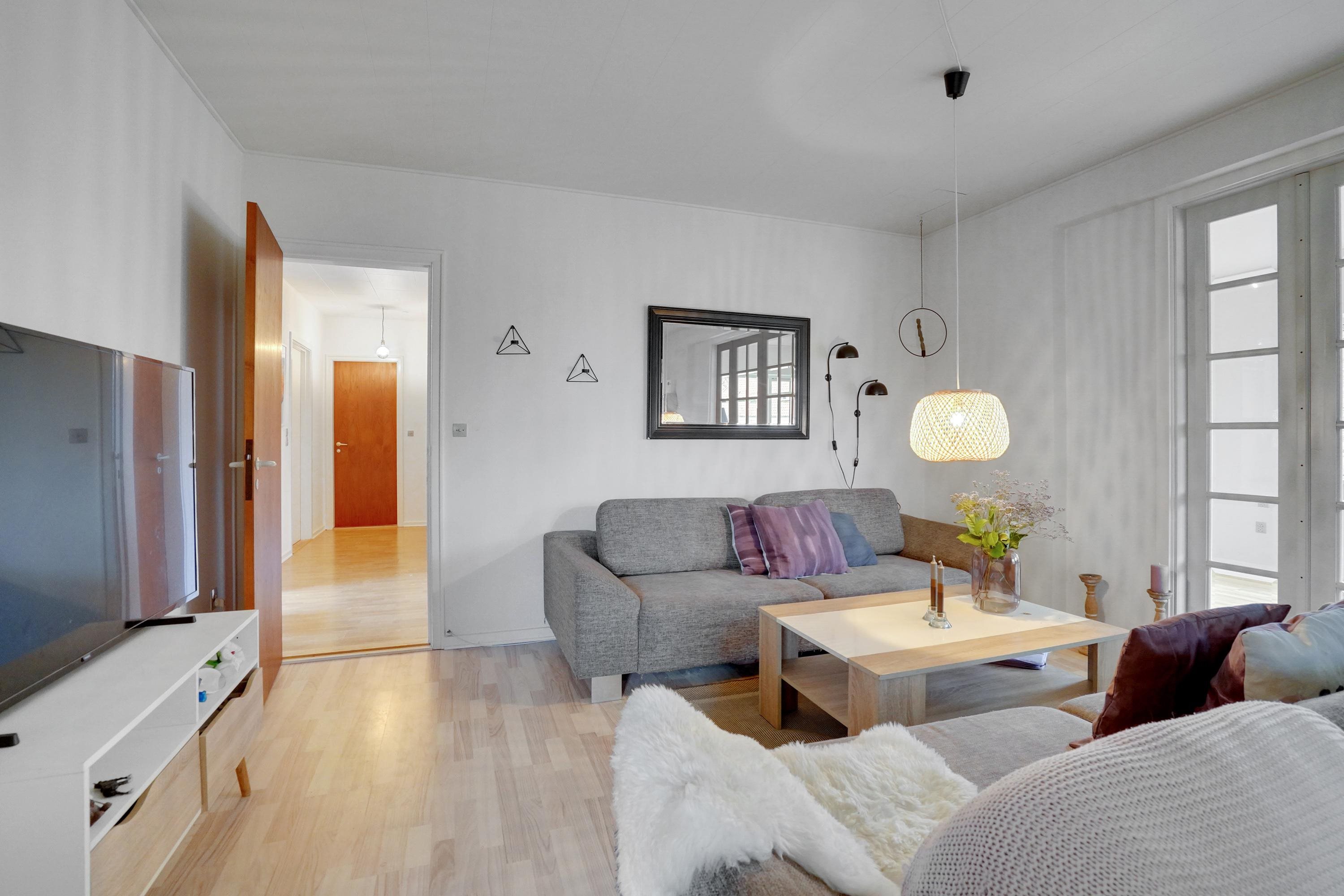 Fremhævet stue billede i fuldskærmstilstand. Billede af Hollufgårdsvej 17, Højby, 5260 Odense S