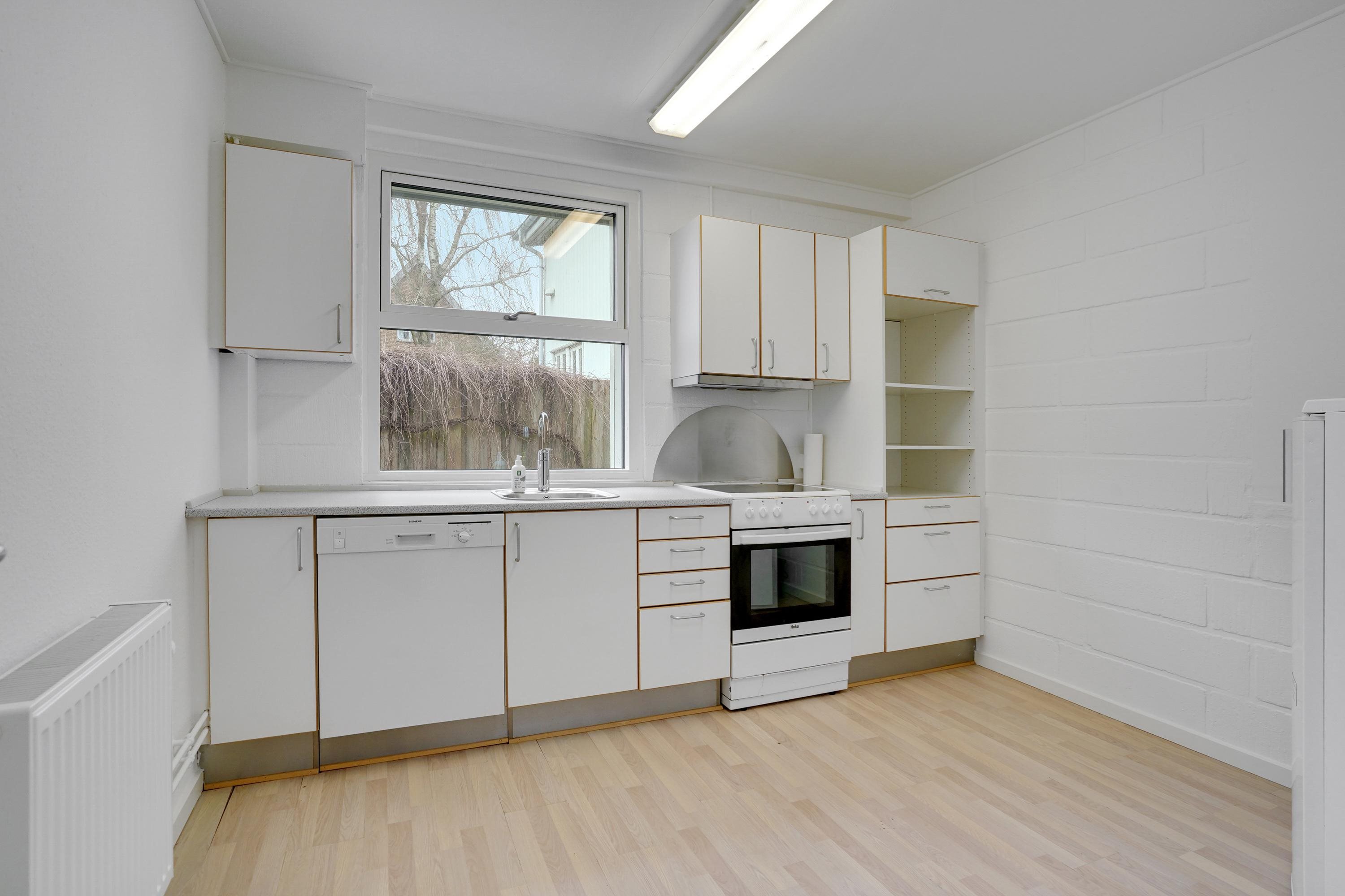 Fremhævet køkken billede i fuldskærmstilstand. Billede af Hollufgårdsvej 17, Højby, 5260 Odense S