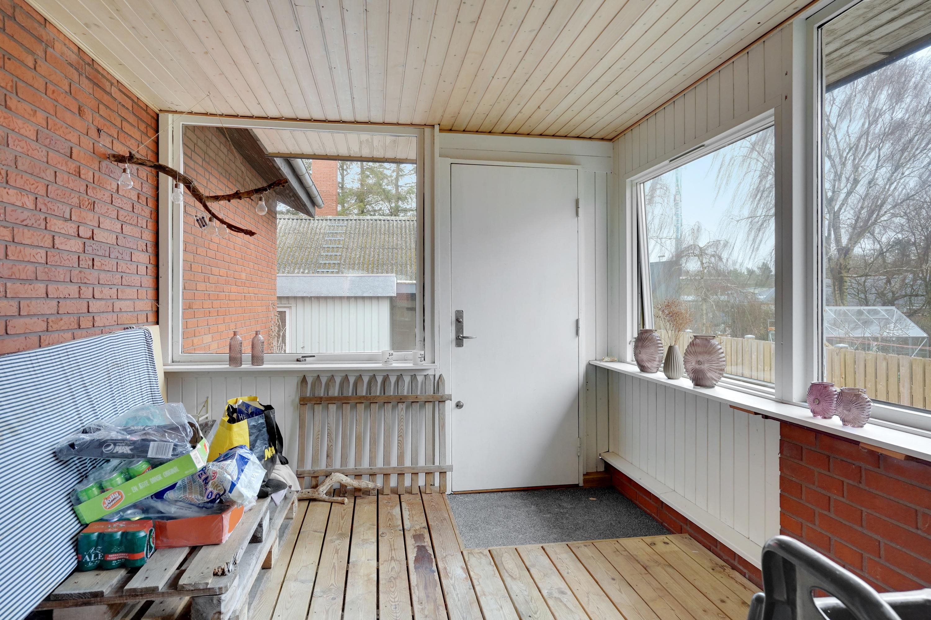 Fremhævet udestue billede i fuldskærmstilstand. Billede af Hollufgårdsvej 17, Højby, 5260 Odense S