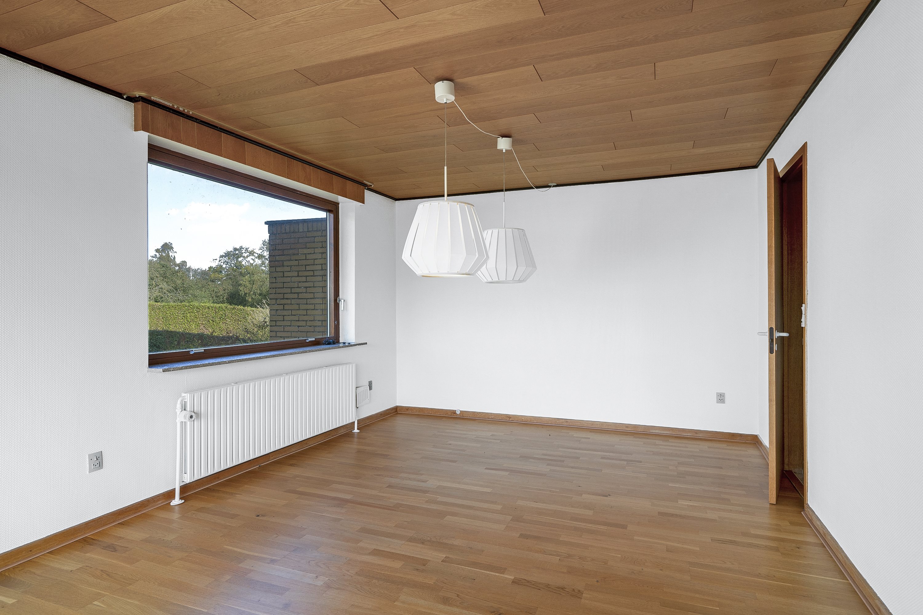 Fremhævet stue billede i fuldskærmstilstand. Billede af Soltoftevej 3, Ø Alling, 8963 Auning