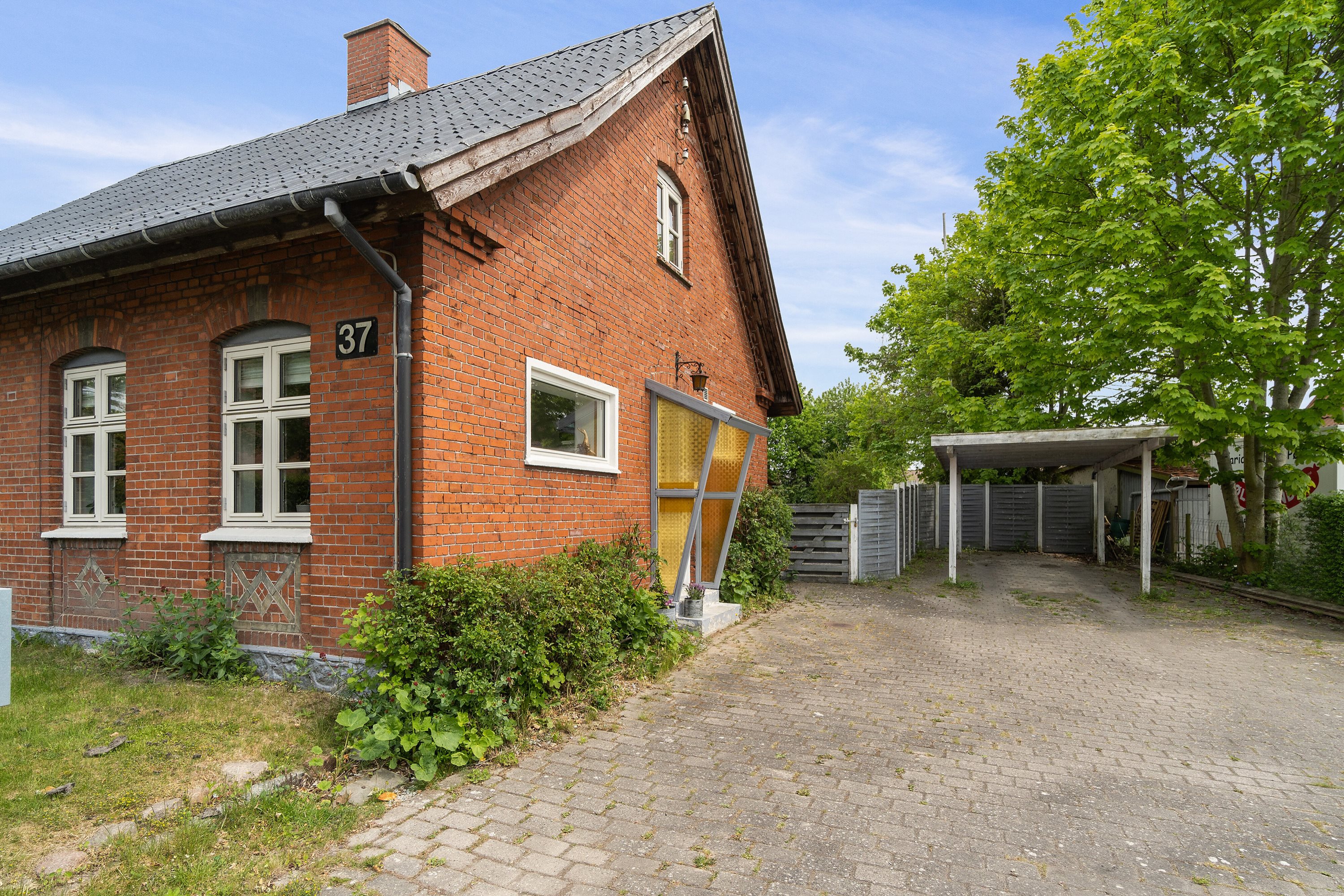 Fremhævet set fra vejen billede i fuldskærmstilstand. Billede af Præstøvej 37, 4640 Faxe