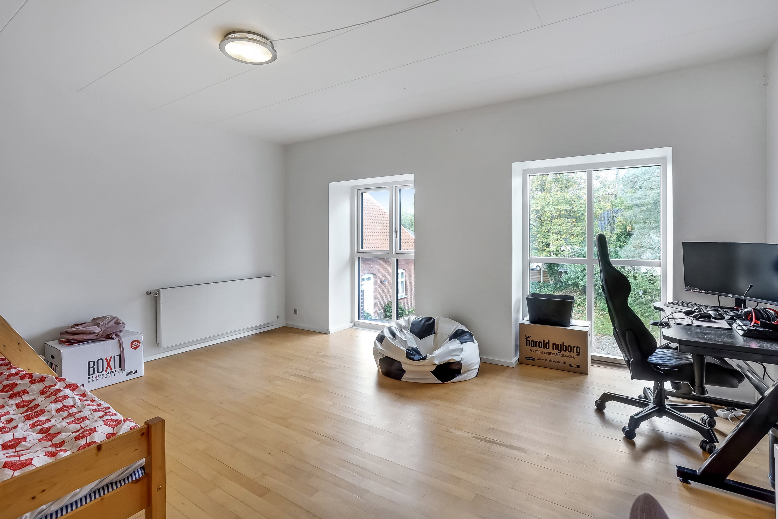 Fremhævet stue billede i fuldskærmstilstand. Billede af Gudenåvej 60, Voervadsbro, 8660 Skanderborg