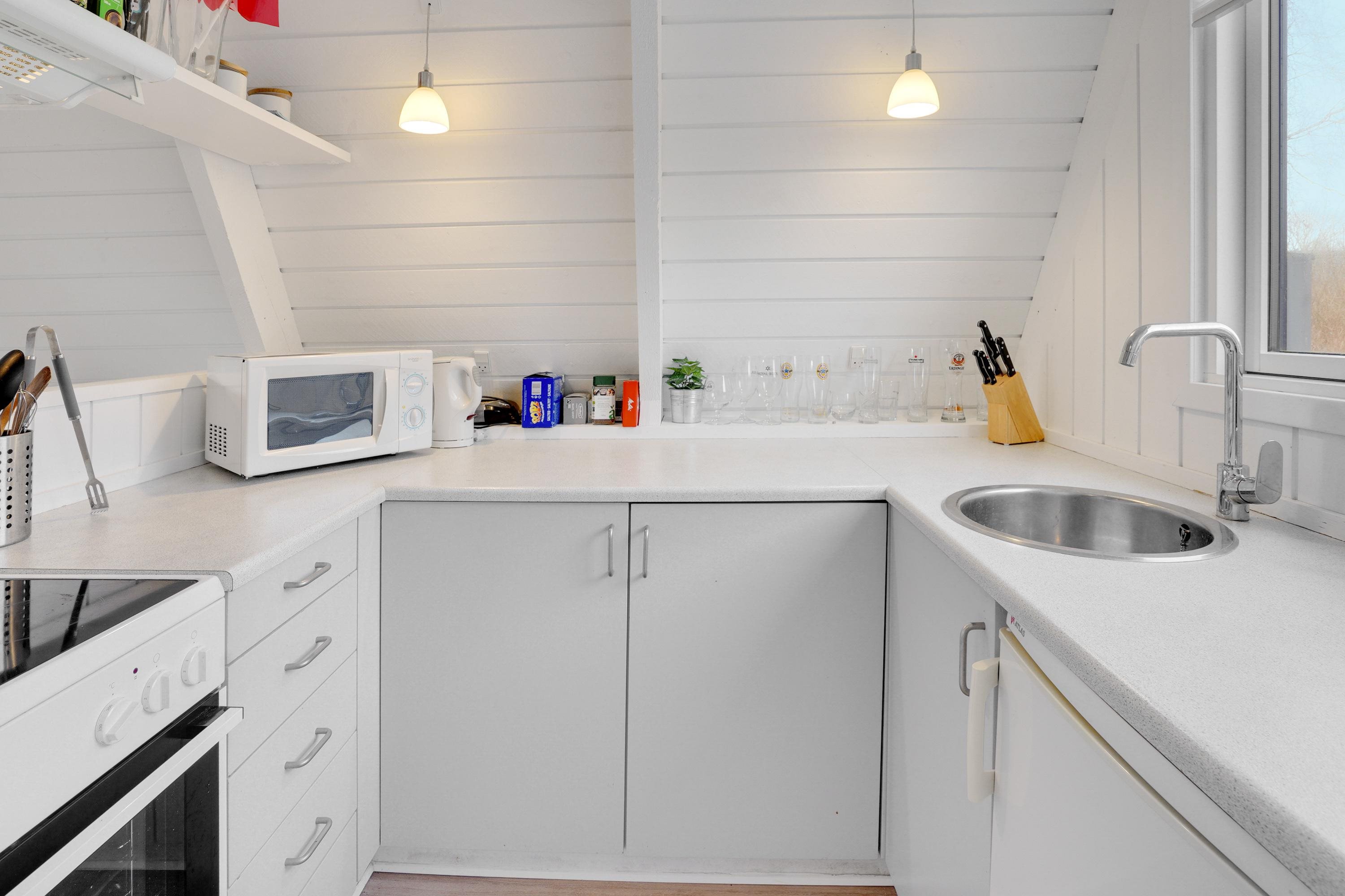 Fremhævet køkken billede i fuldskærmstilstand. Billede af Golfsvinget 243, Gatten, 9640 Farsø