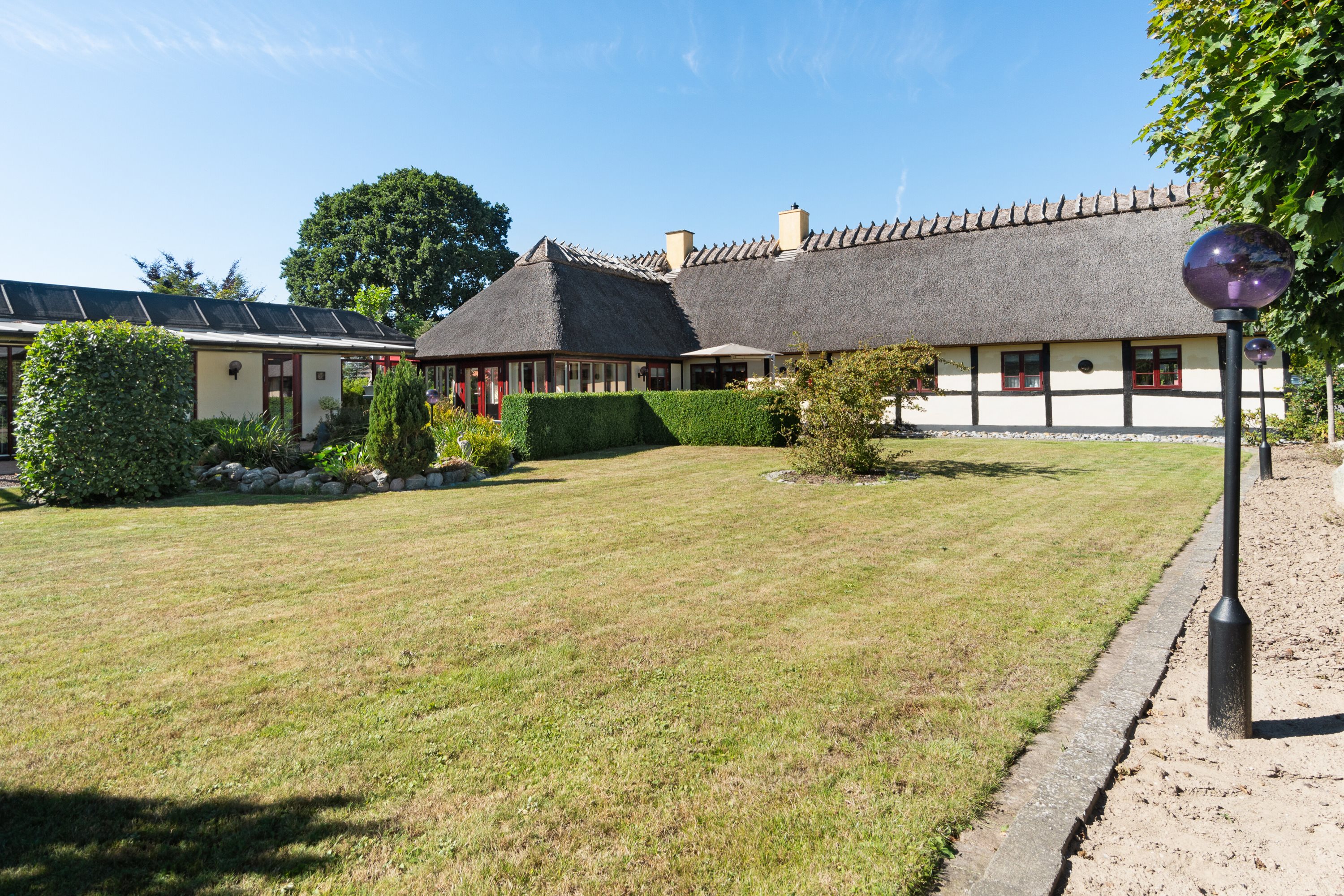 Fremhævet set fra haven billede i fuldskærmstilstand. Billede af Næbvej 25, 4720 Præstø