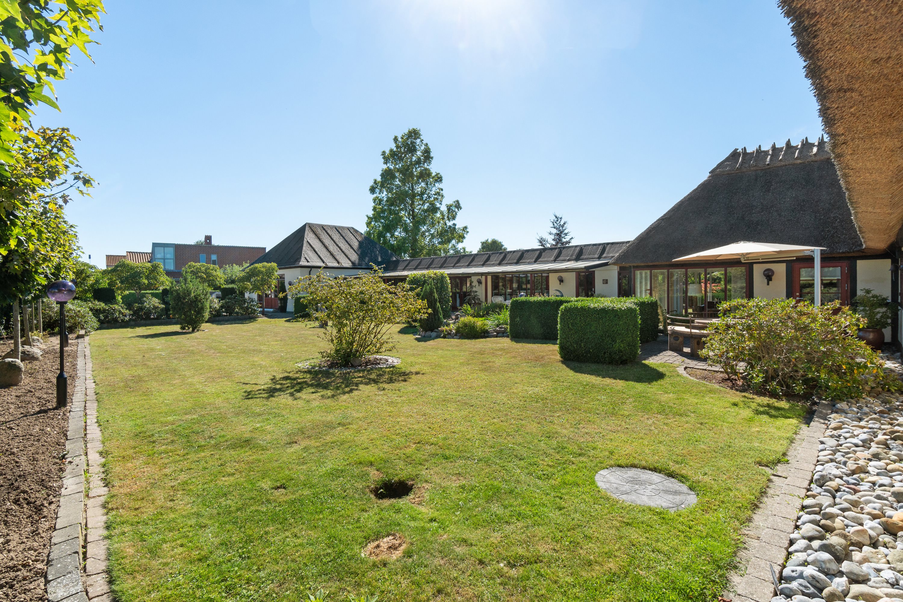 Fremhævet set fra haven billede i fuldskærmstilstand. Billede af Næbvej 25, 4720 Præstø