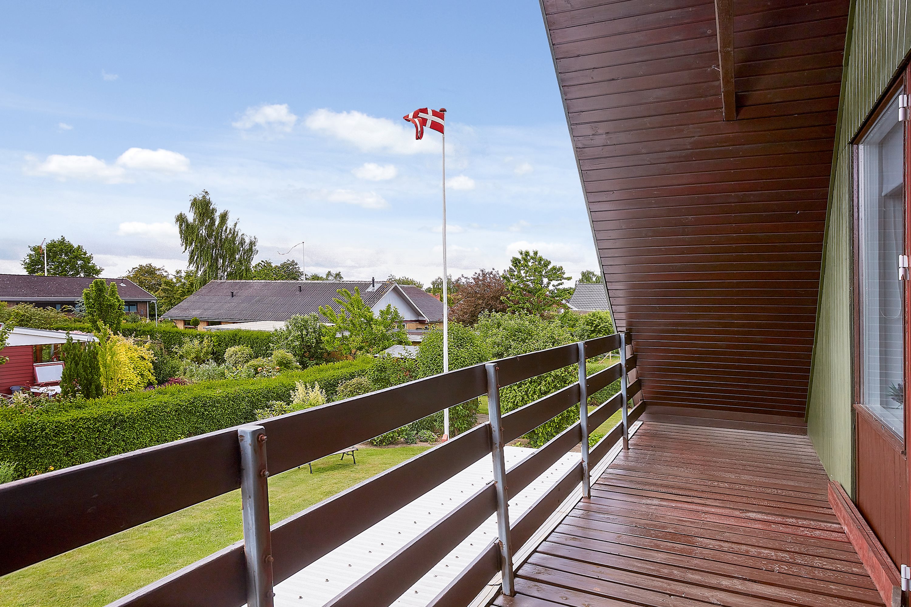 Fremhævet altan billede i fuldskærmstilstand. Billede af Ligustervænget 7, 7130 Juelsminde