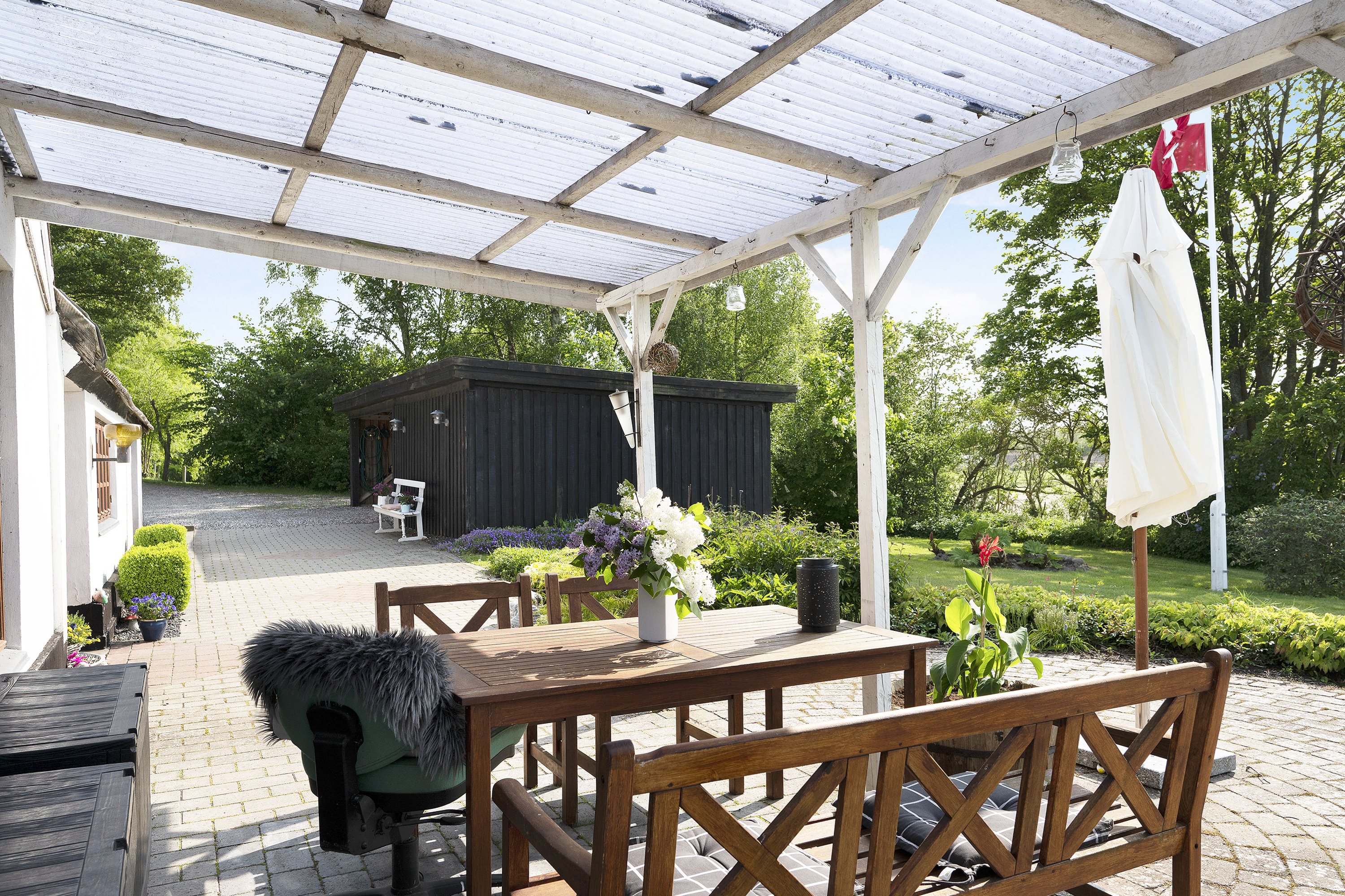 Fremhævet overdækket terrasse billede i fuldskærmstilstand. Billede af Mamrelundsvej 2, Vejlby, 8961 Allingåbro