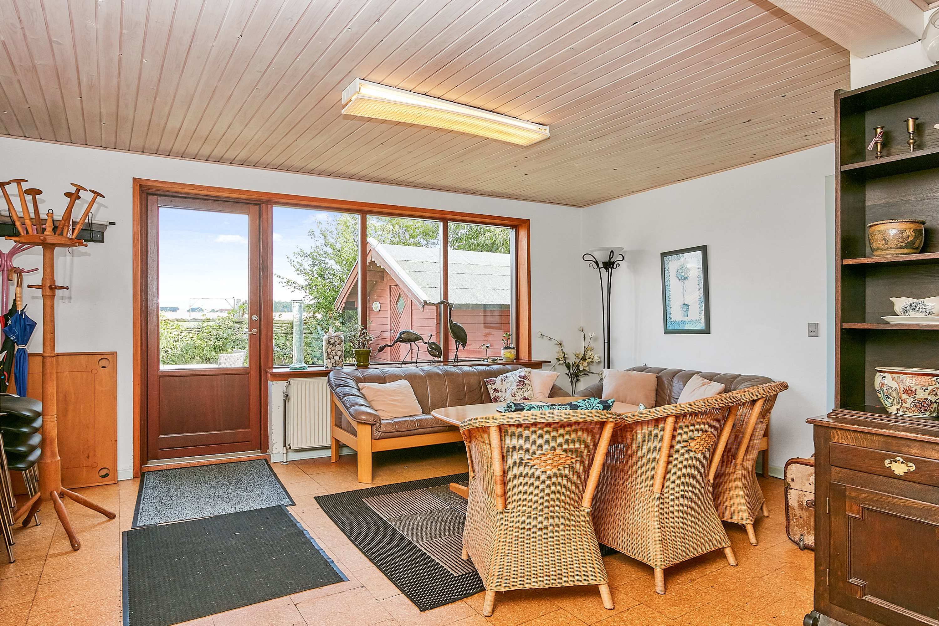 Fremhævet stue billede i fuldskærmstilstand. Billede af Vestre Kirkevej 2, Hjarnø, 7130 Juelsminde