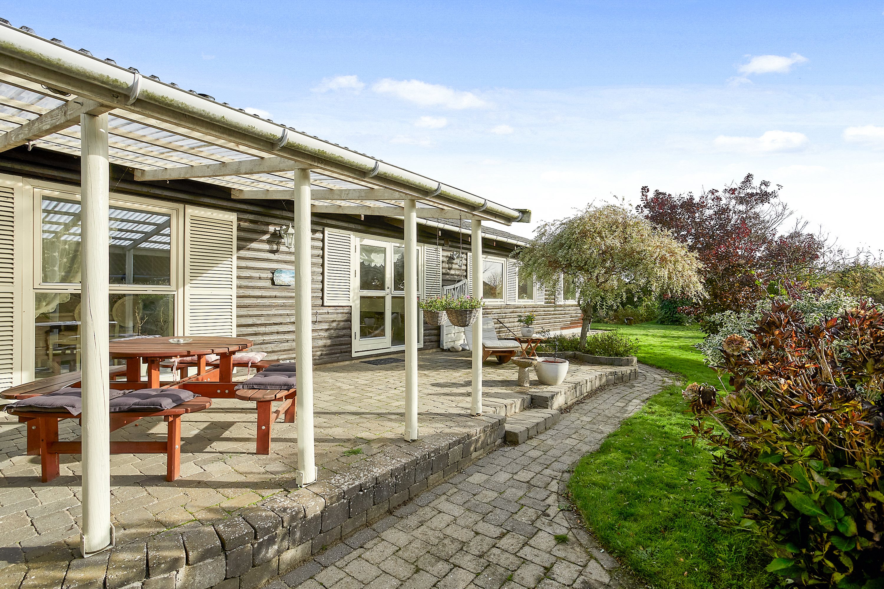 Fremhævet overdækket terrasse billede i fuldskærmstilstand. Billede af Birkevej 7, 8783 Hornsyld