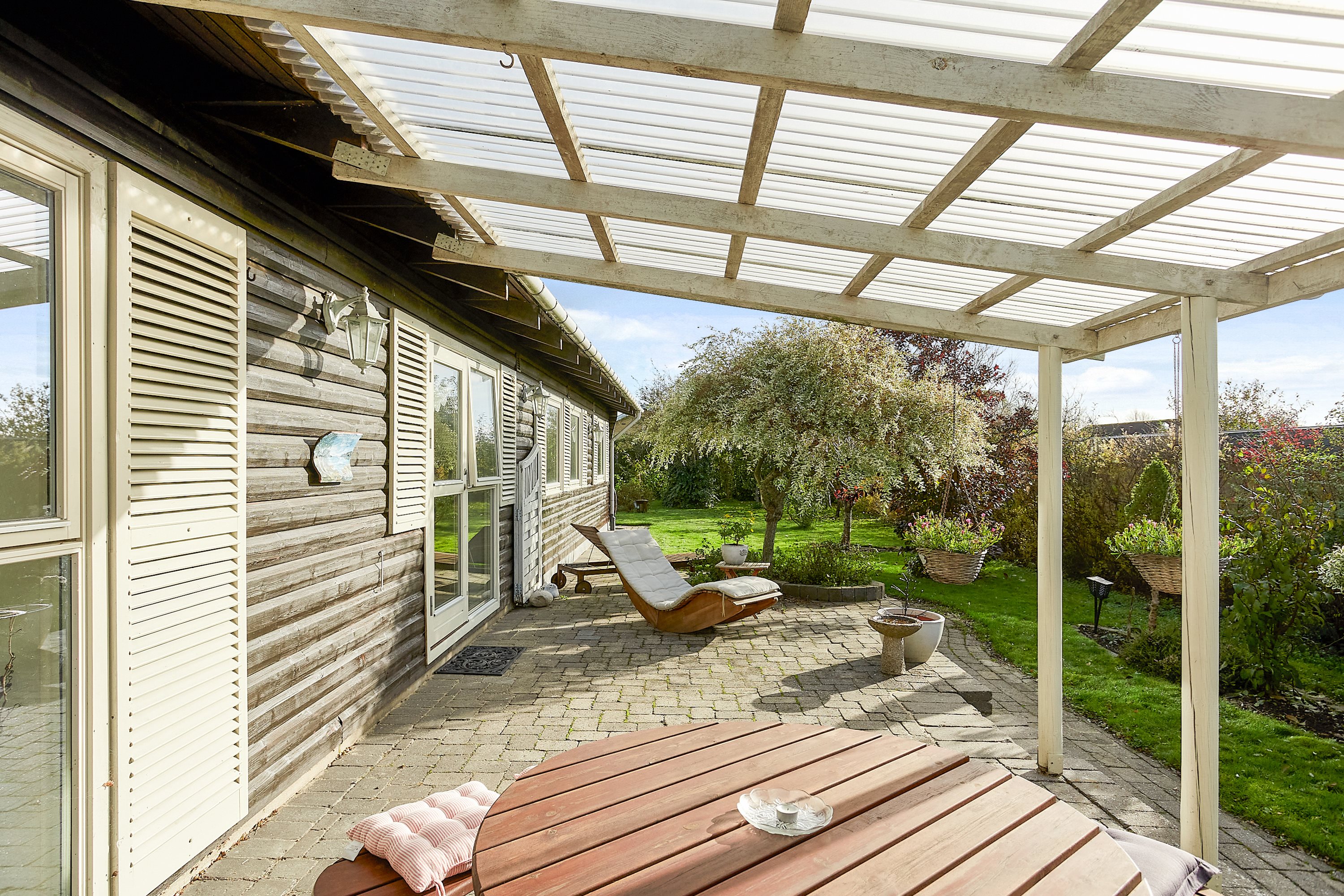 Fremhævet overdækket terrasse billede i fuldskærmstilstand. Billede af Birkevej 7, 8783 Hornsyld