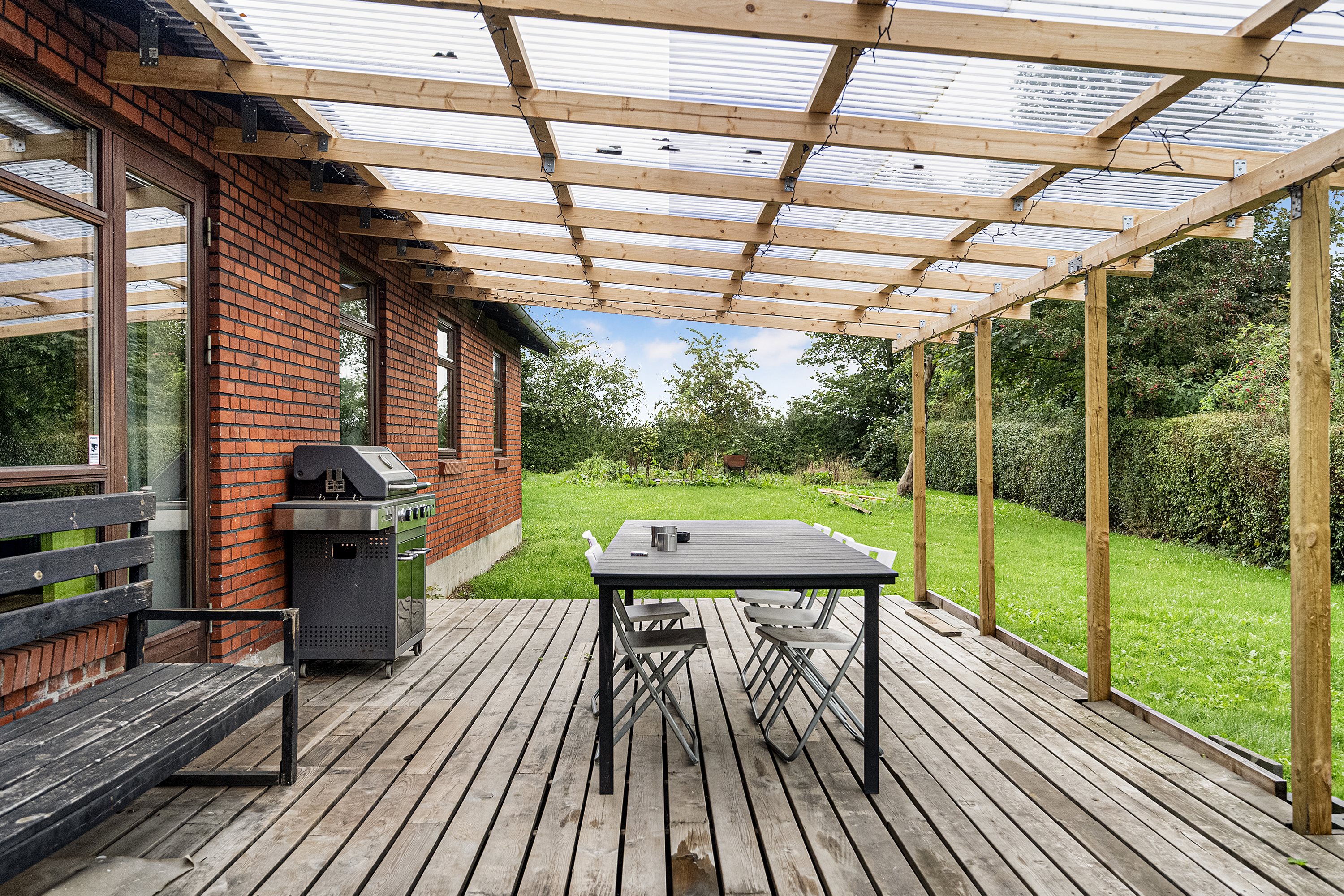 Fremhævet terrasse billede i fuldskærmstilstand. Billede af Møgelvangsvej 12, Dalbyover, 8970 Havndal