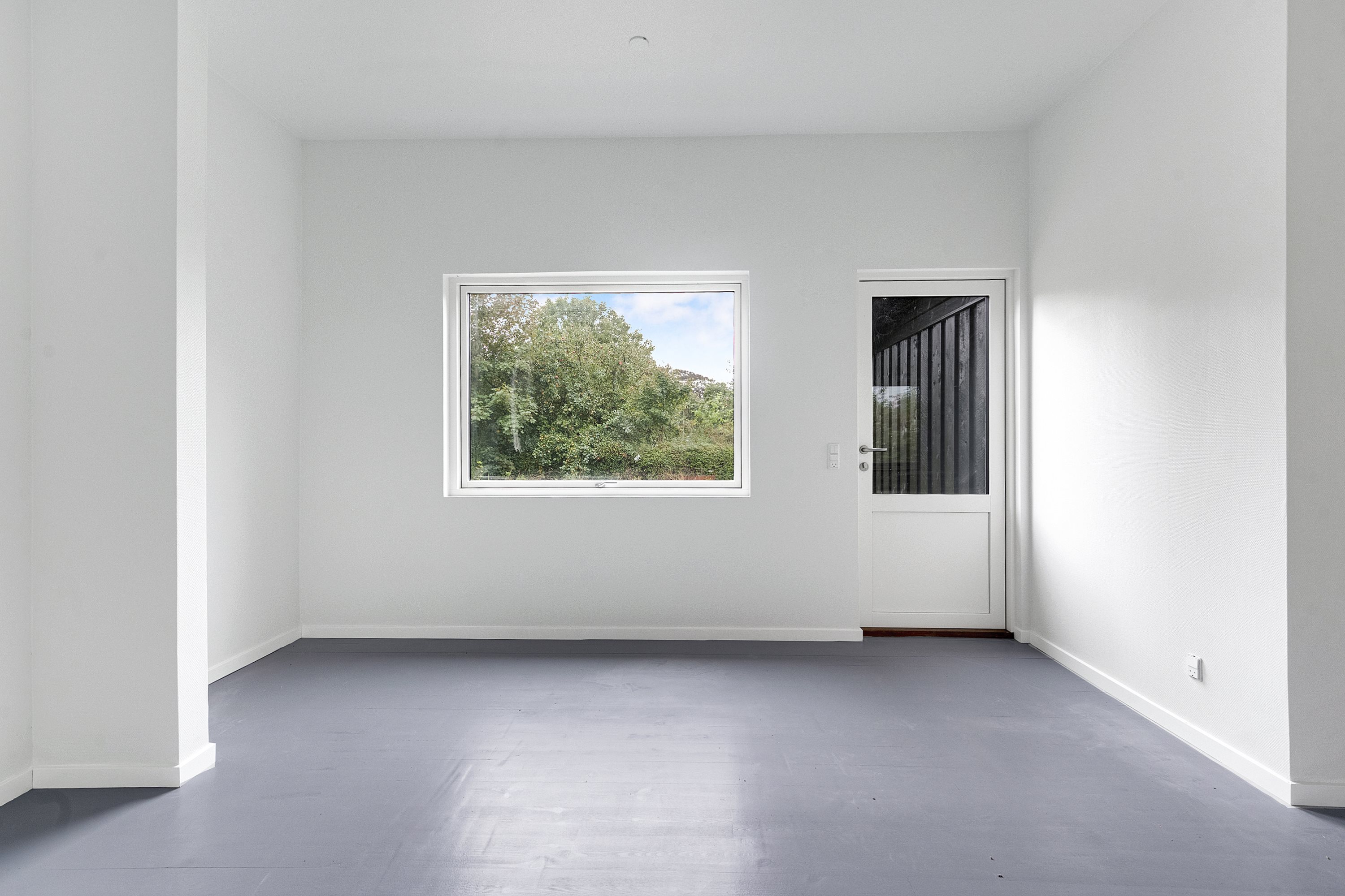 Fremhævet stue billede i fuldskærmstilstand. Billede af Møgelvangsvej 12, Dalbyover, 8970 Havndal