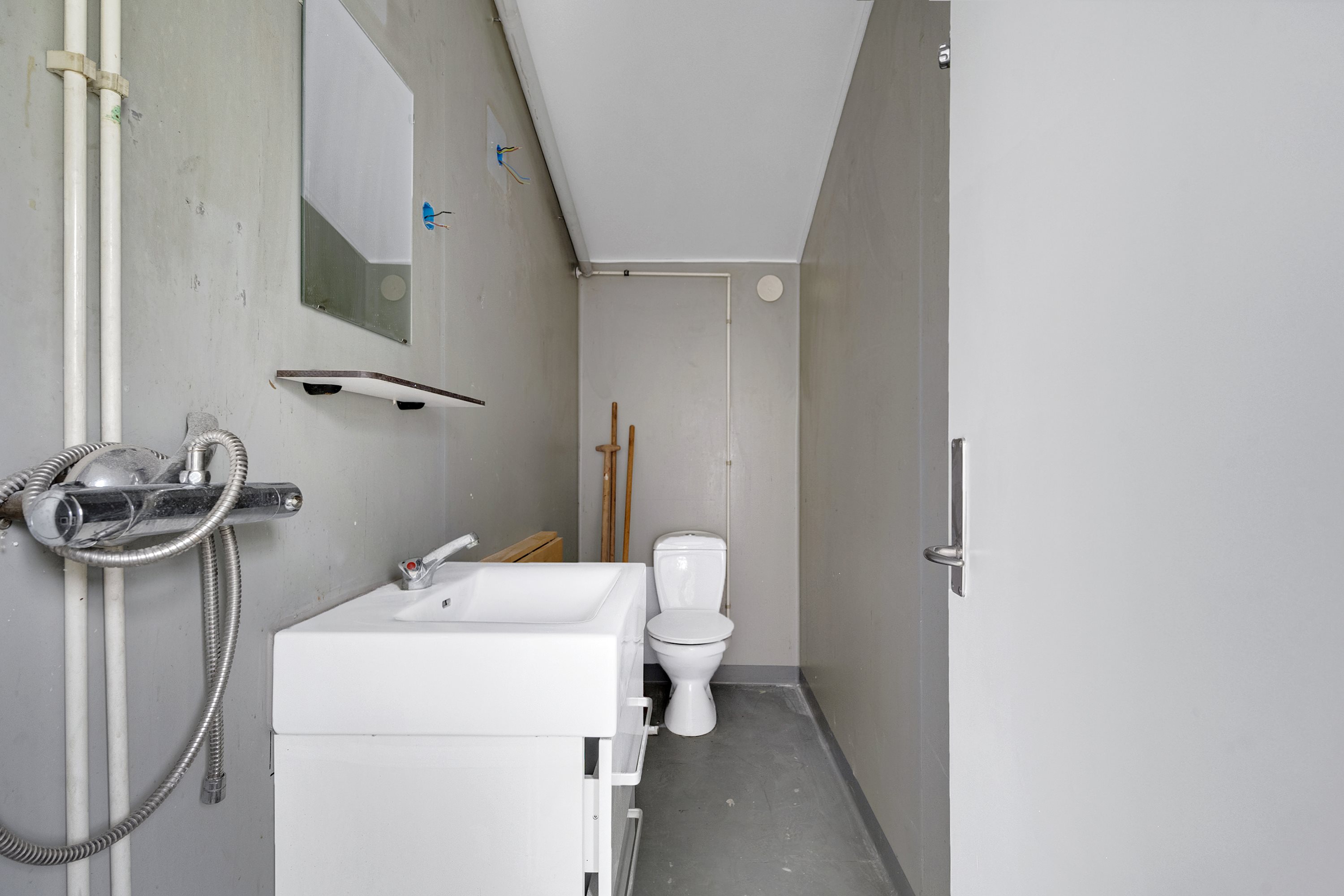 Fremhævet badeværelse billede i fuldskærmstilstand. Billede af Møgelvangsvej 12, Dalbyover, 8970 Havndal