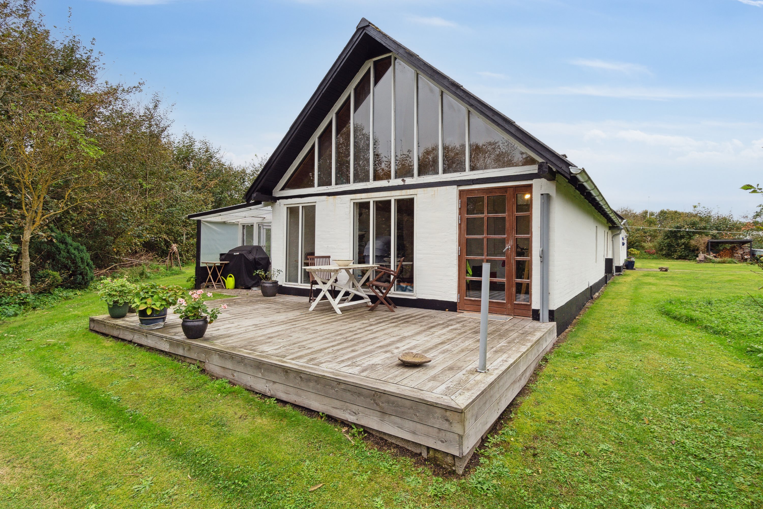 Fremhævet set fra haven billede i fuldskærmstilstand. Billede af Bindslevvej 41, Tversted, 9881 Bindslev