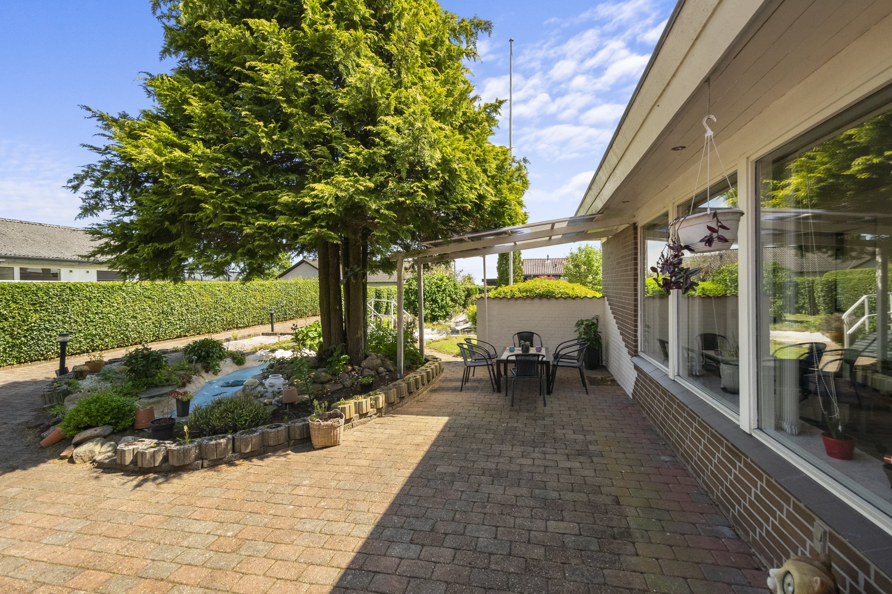 Fremhævet terrasse billede i fuldskærmstilstand. Billede af Gammelgårdsvej 24, 7321 Gadbjerg