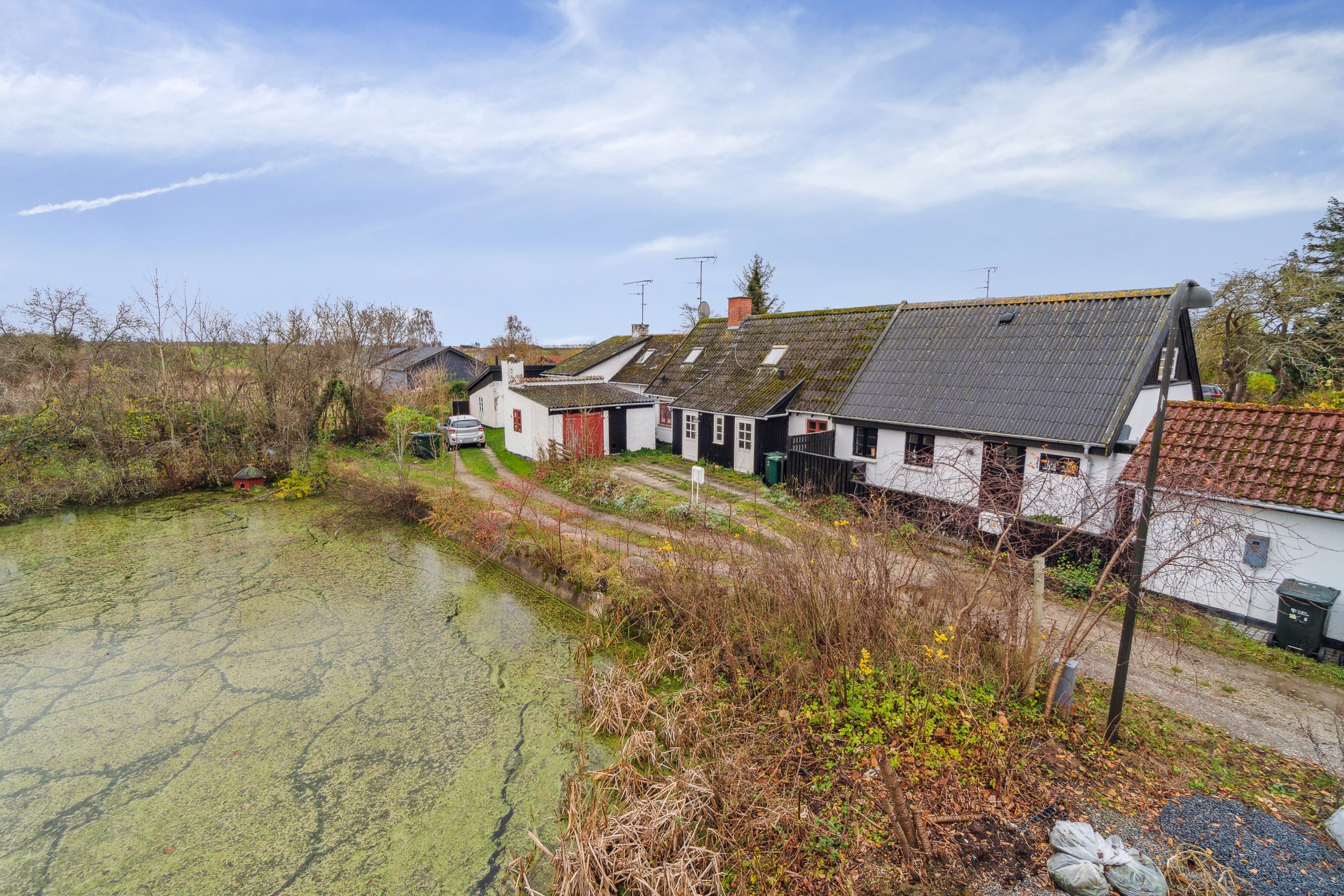 Fremhævet set fra haven billede i fuldskærmstilstand. Billede af Herslev Kærvej 4, Herslev, 4000 Roskilde