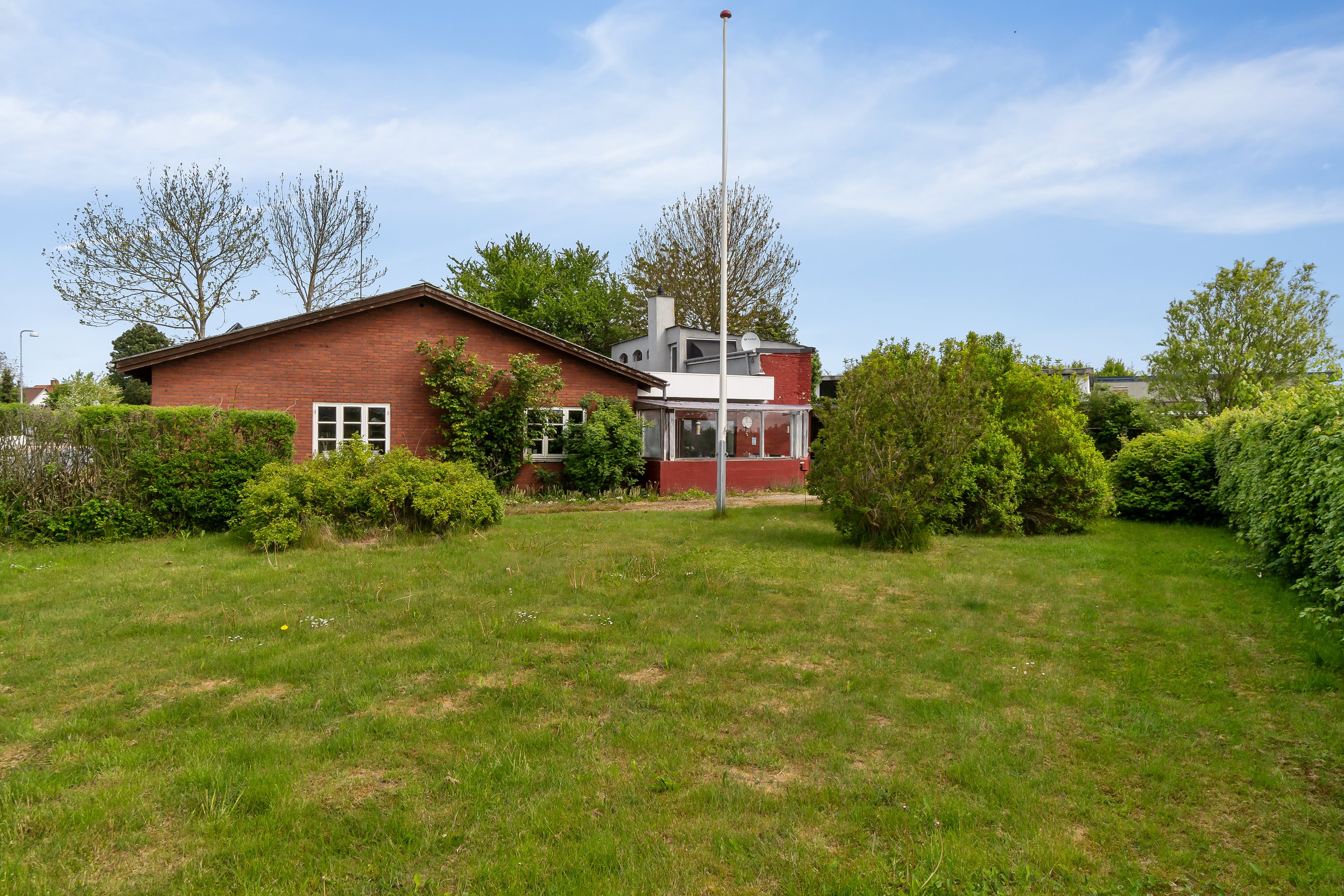 Fremhævet facade havesiden billede i fuldskærmstilstand. Billede af Lundbyvej 92, Tåsinge, 5700 Svendborg