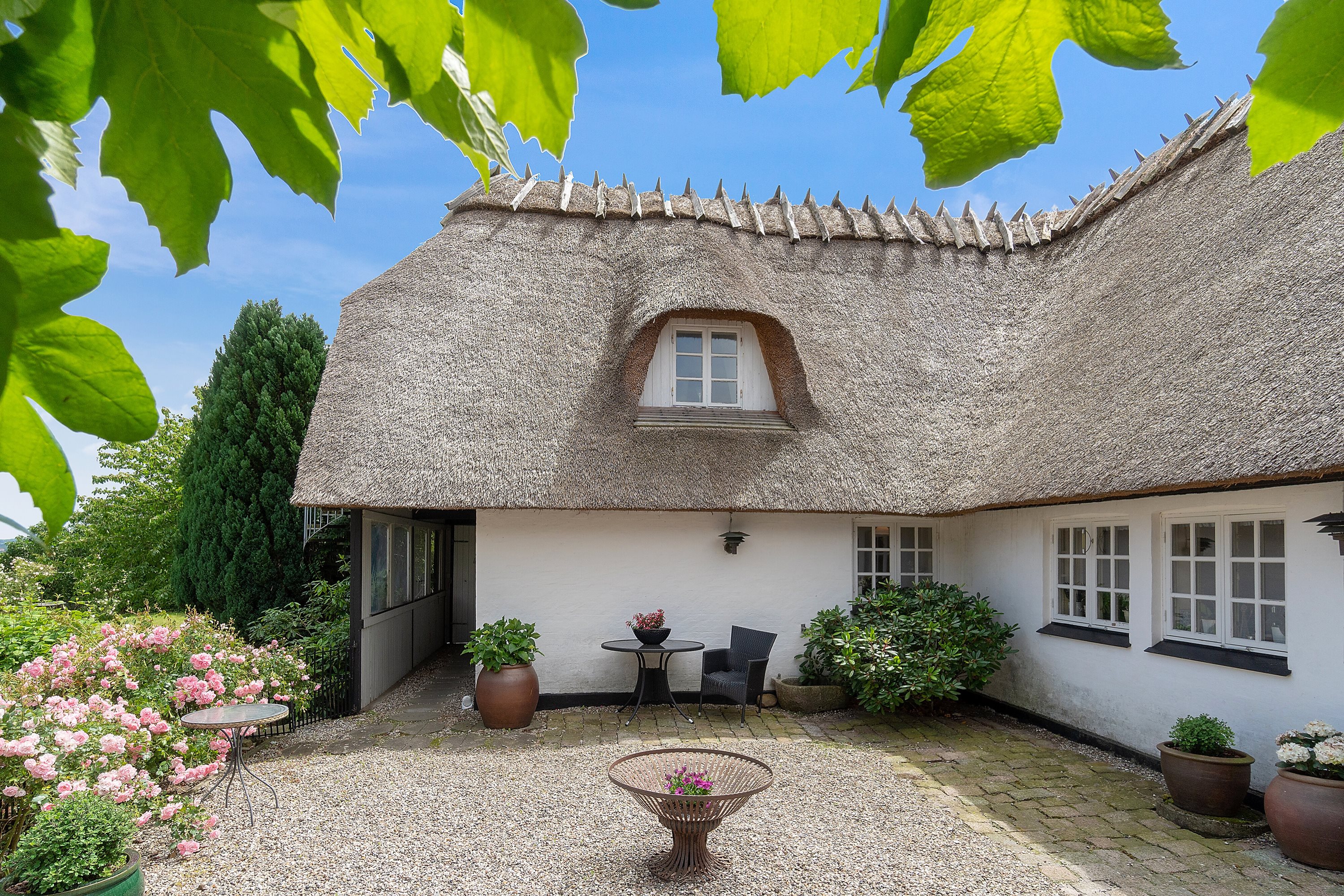 Fremhævet set fra haven billede i fuldskærmstilstand. Billede af Sinebjergvej 9, Bjerne, 5600 Faaborg