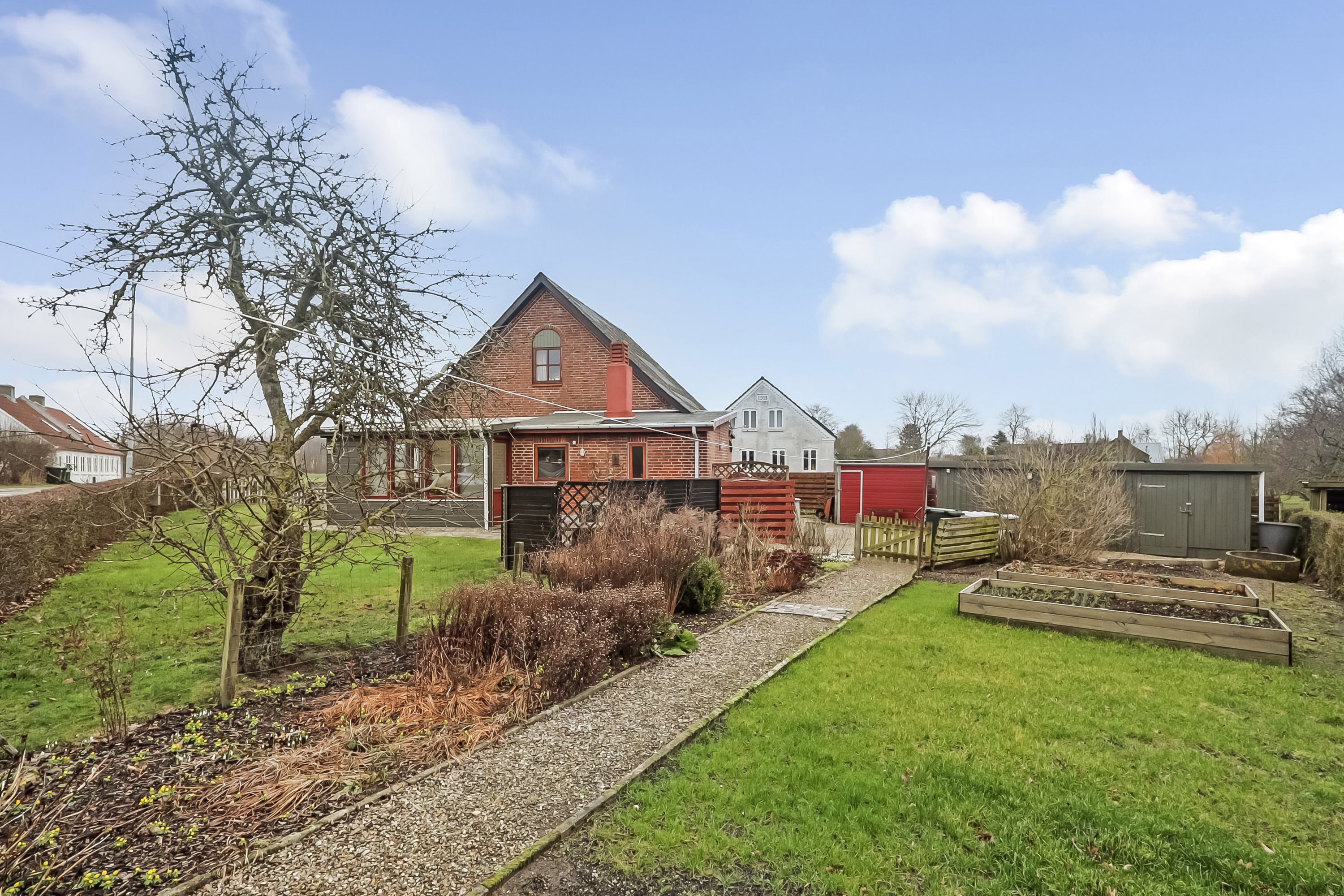 Fremhævet ejendommen billede i fuldskærmstilstand. Billede af Grønnegaardsvej 1, Sdr Longelse, 5900 Rudkøbing