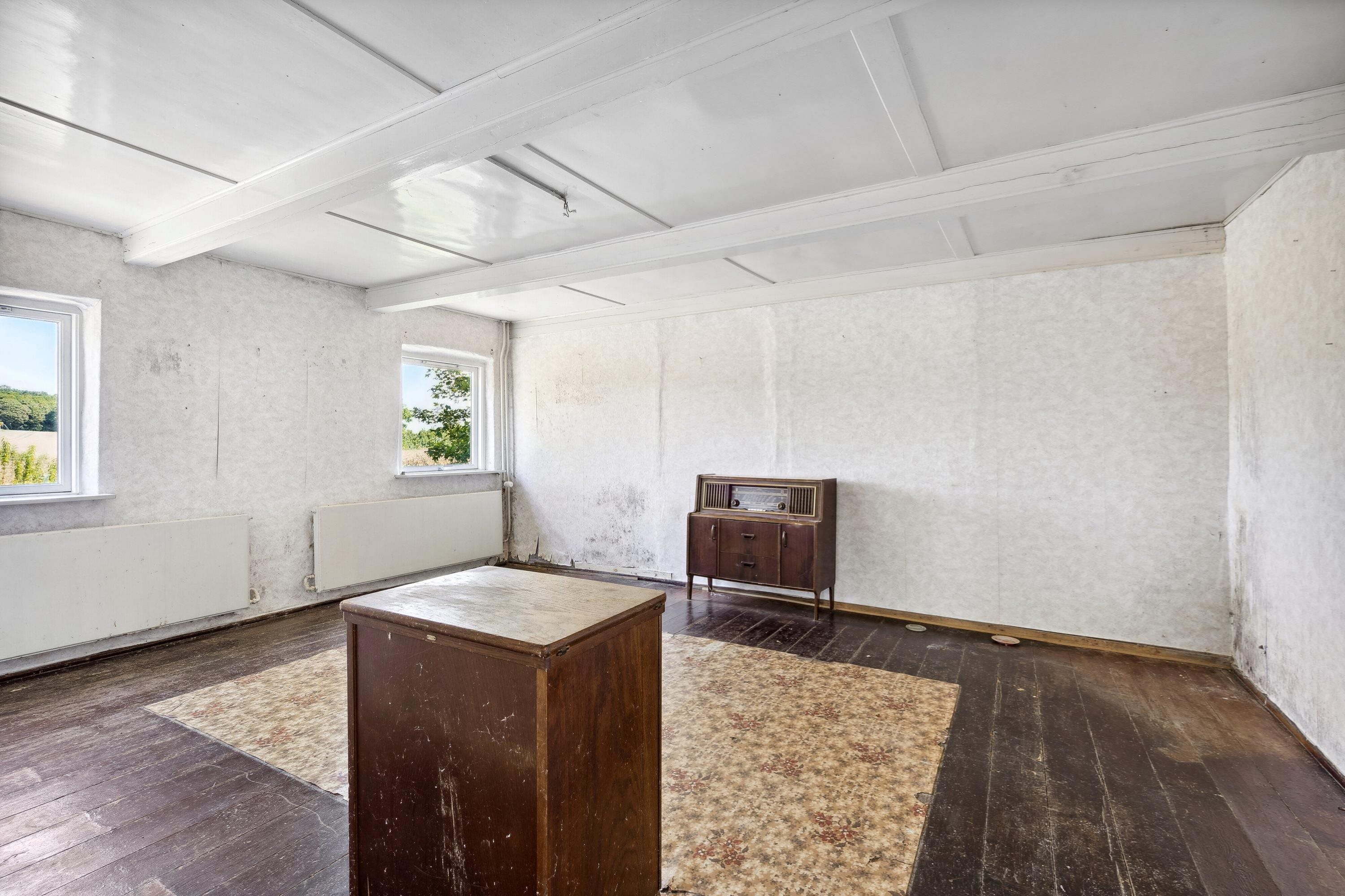 Fremhævet stue billede i fuldskærmstilstand. Billede af Strandbakken 3, Helnæs, 5631 Ebberup