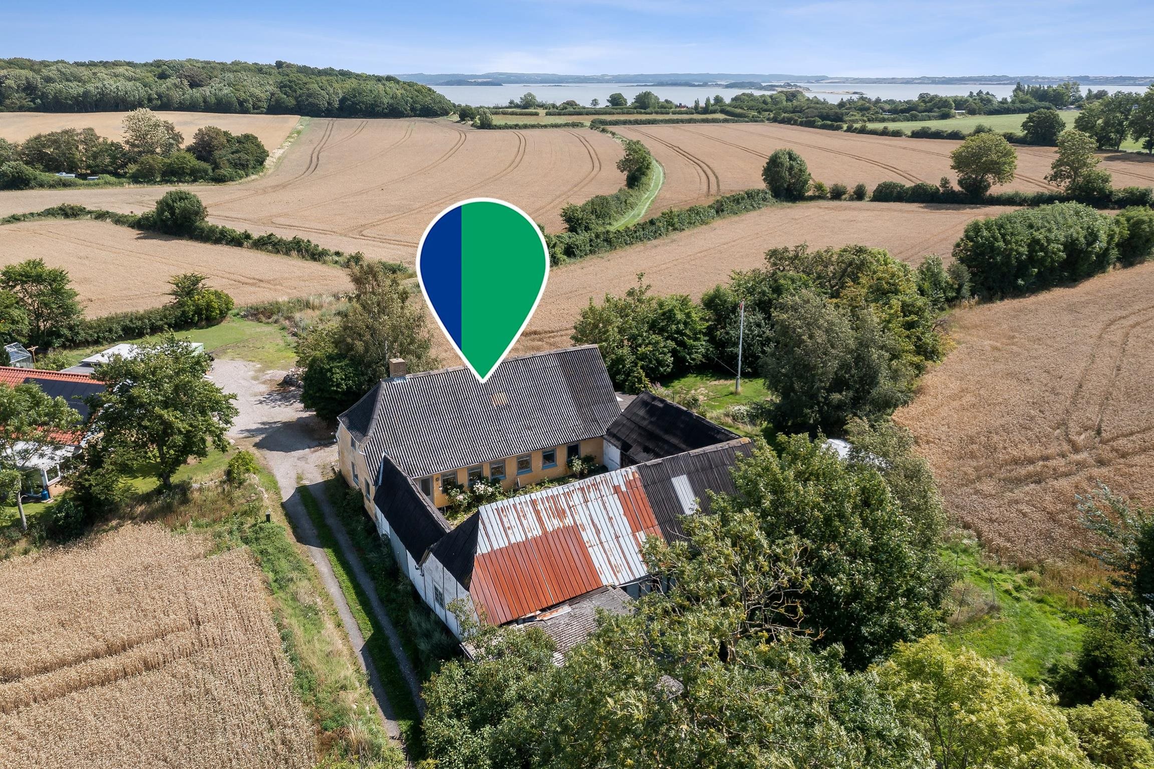 Fremhævet ejendommen billede i fuldskærmstilstand. Billede af Strandbakken 3, Helnæs, 5631 Ebberup