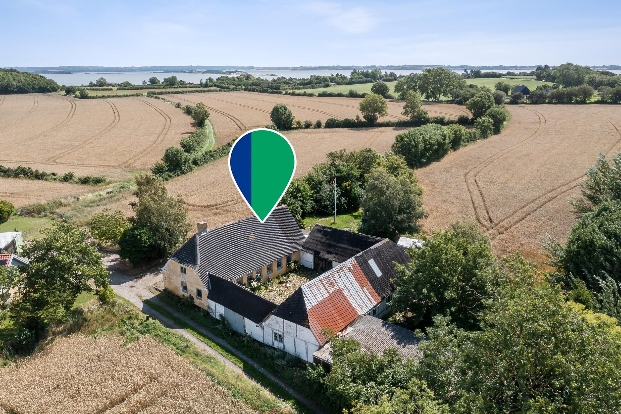 Fremhævet ejendommen billede i fuldskærmstilstand. Billede af Strandbakken 3, Helnæs, 5631 Ebberup