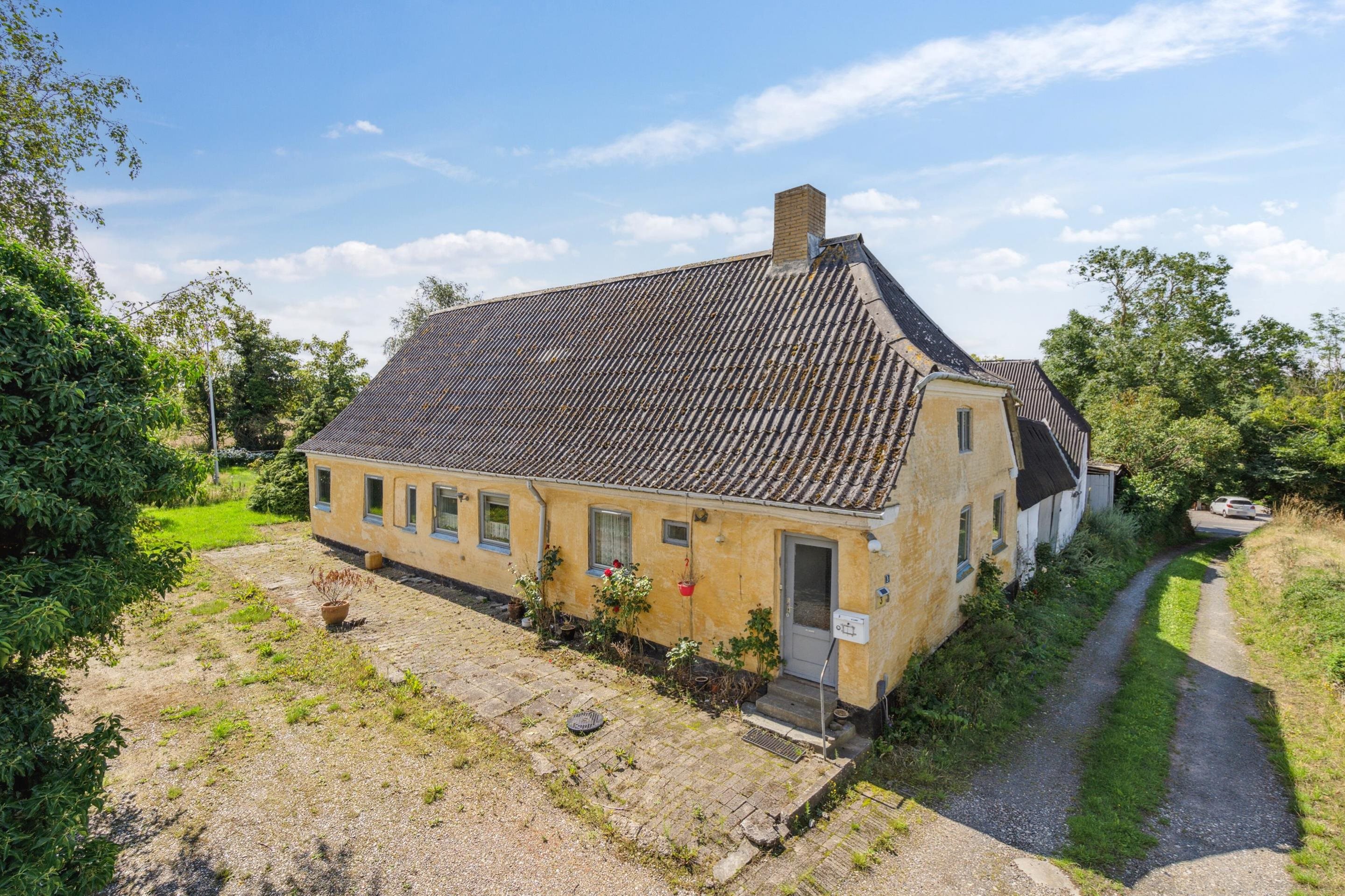 Fremhævet ejendommen billede i fuldskærmstilstand. Billede af Strandbakken 3, Helnæs, 5631 Ebberup