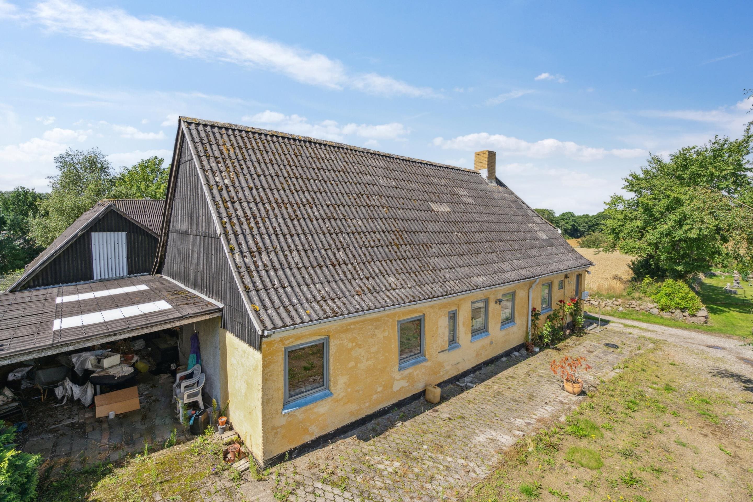 Fremhævet ejendommen billede i fuldskærmstilstand. Billede af Strandbakken 3, Helnæs, 5631 Ebberup