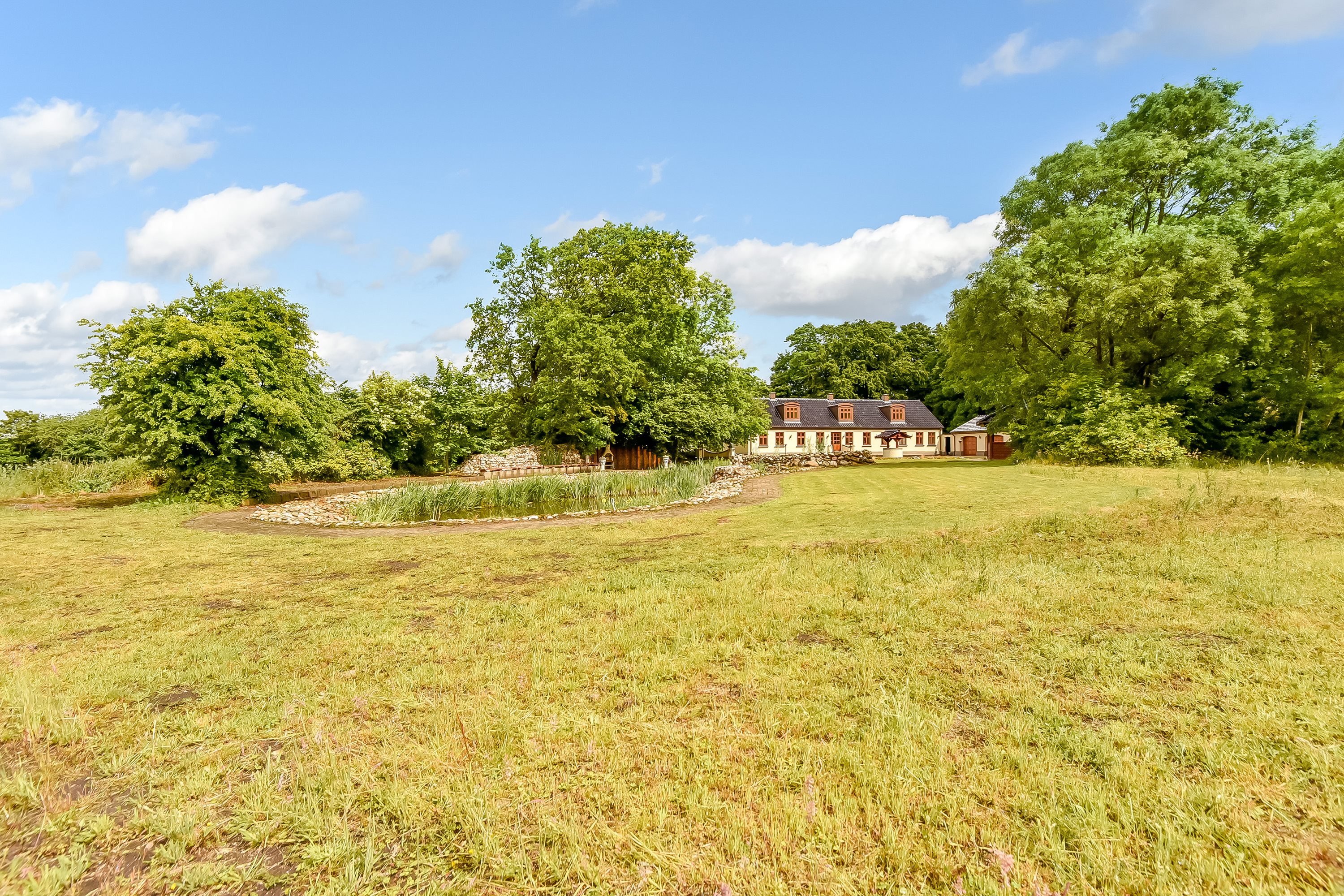 Fremhævet ejendommen billede i fuldskærmstilstand. Billede af Albækvej 47, Snejbjerg, 7400 Herning